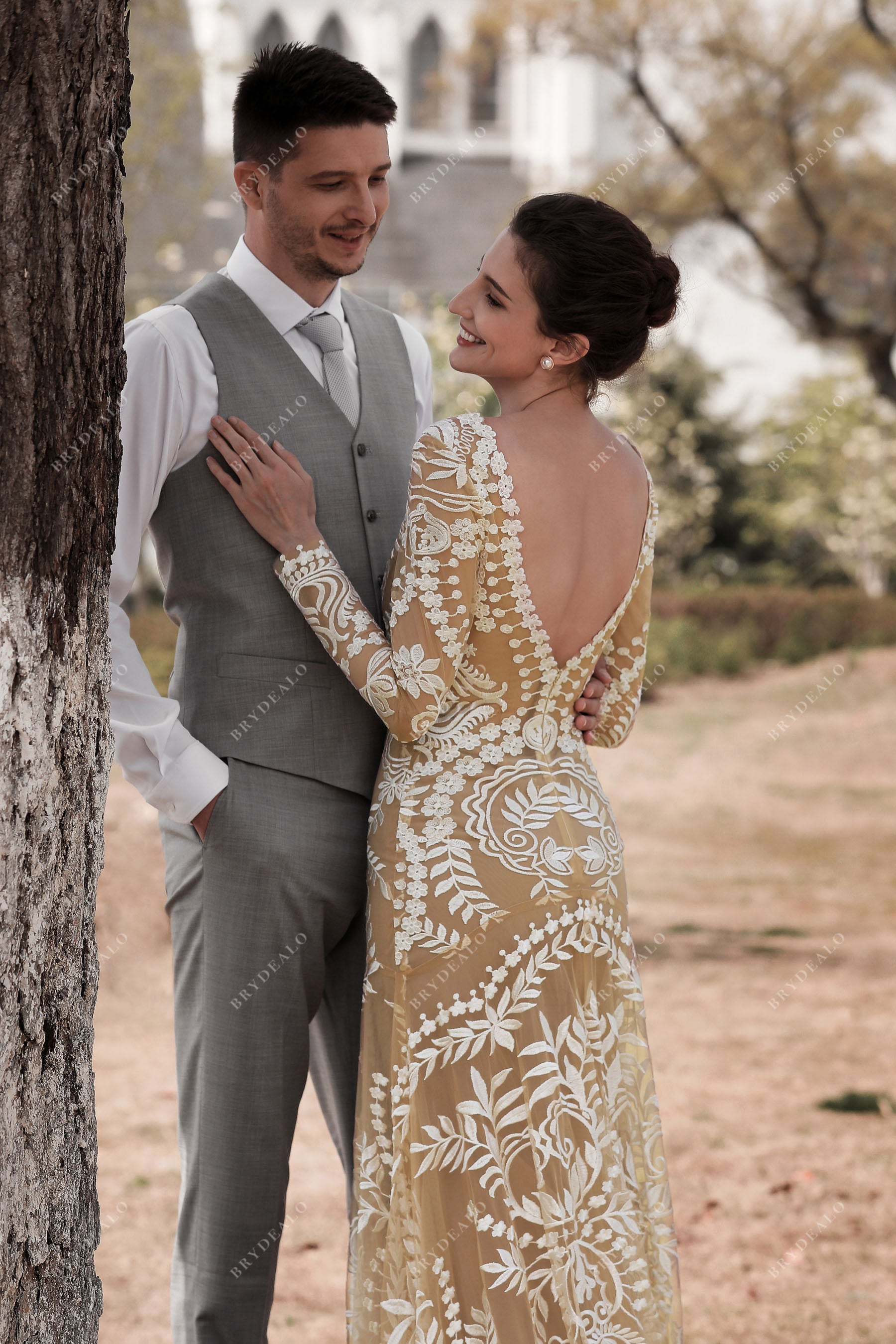 open V-back ivory lace bridal dress