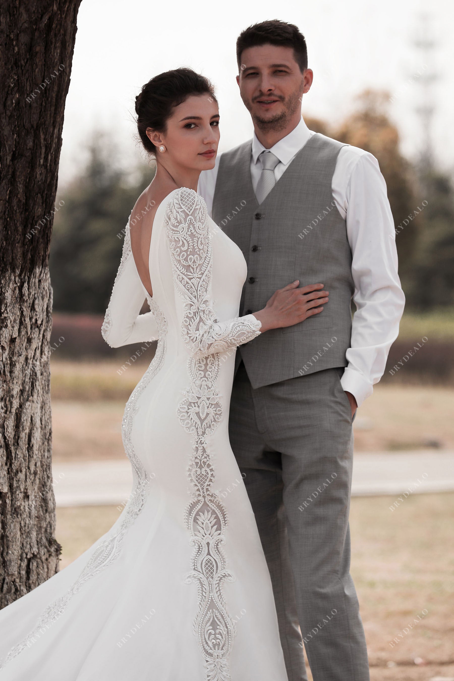 V-back lace sleeved crepe mermaid wedding dress