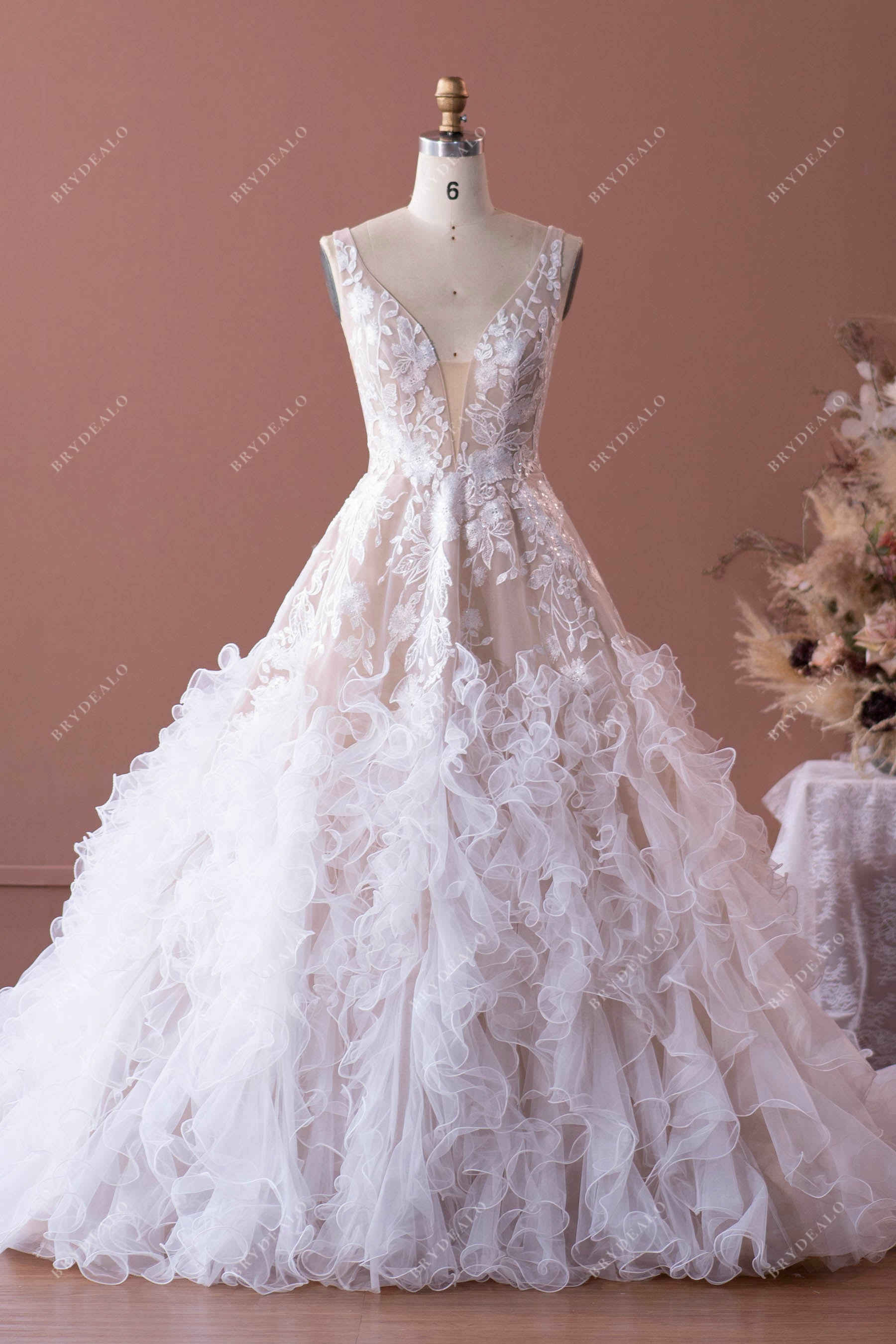 sleeveless plunging neck ruffled tulle wedding dress