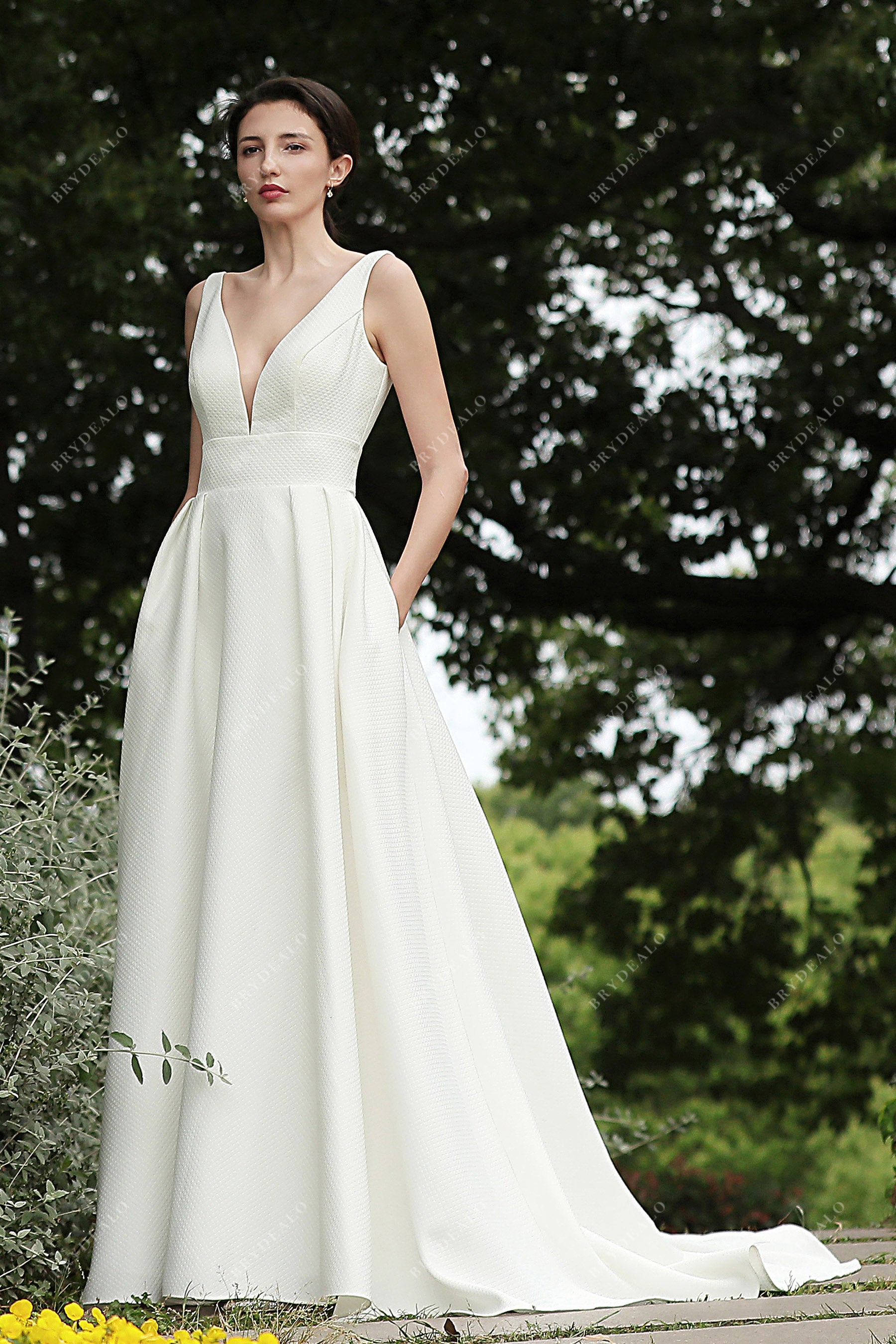plunging neck sleeveless textured pockets wedding dress