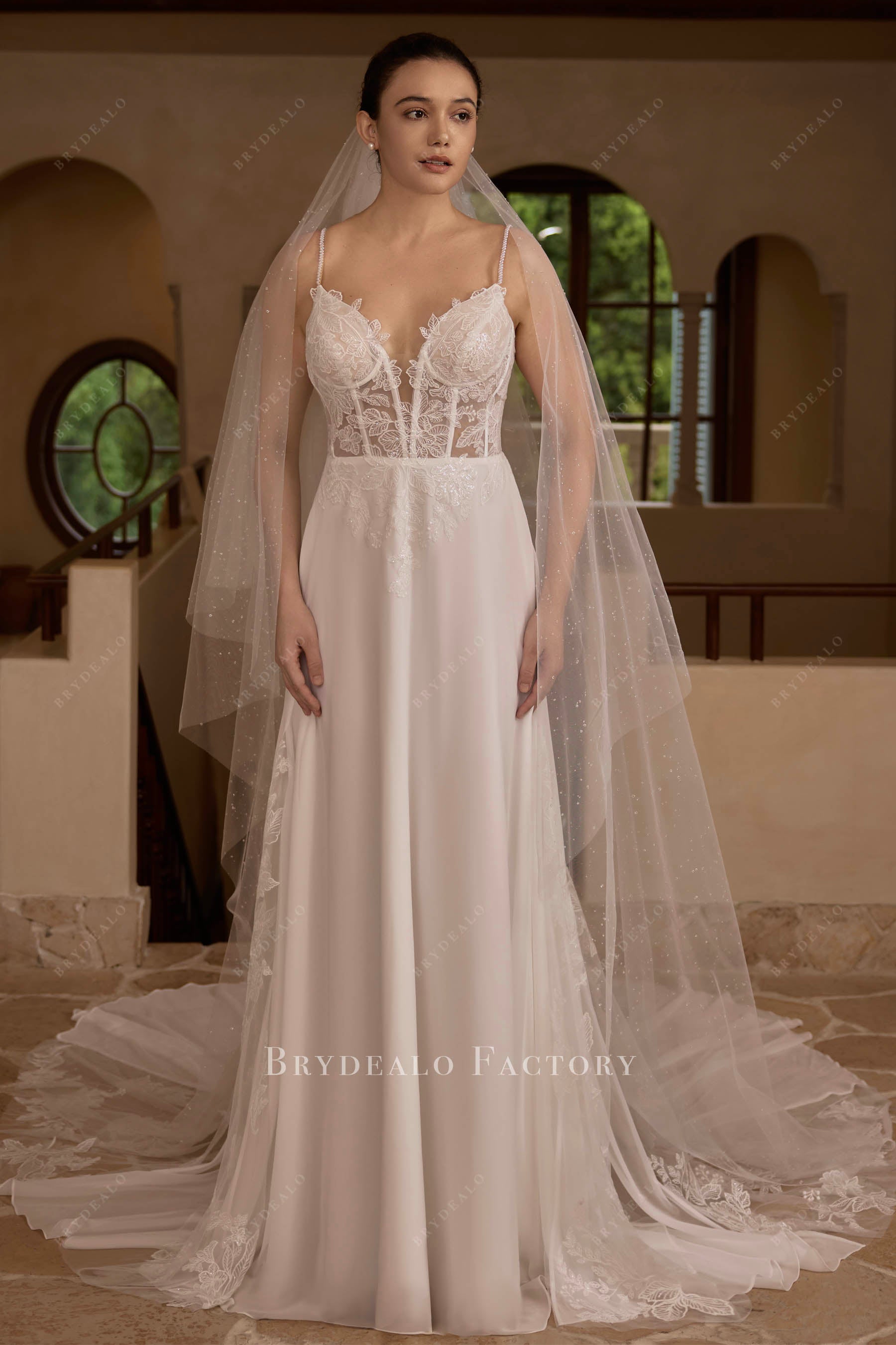 flowing chiffon plunging neck wedding dress