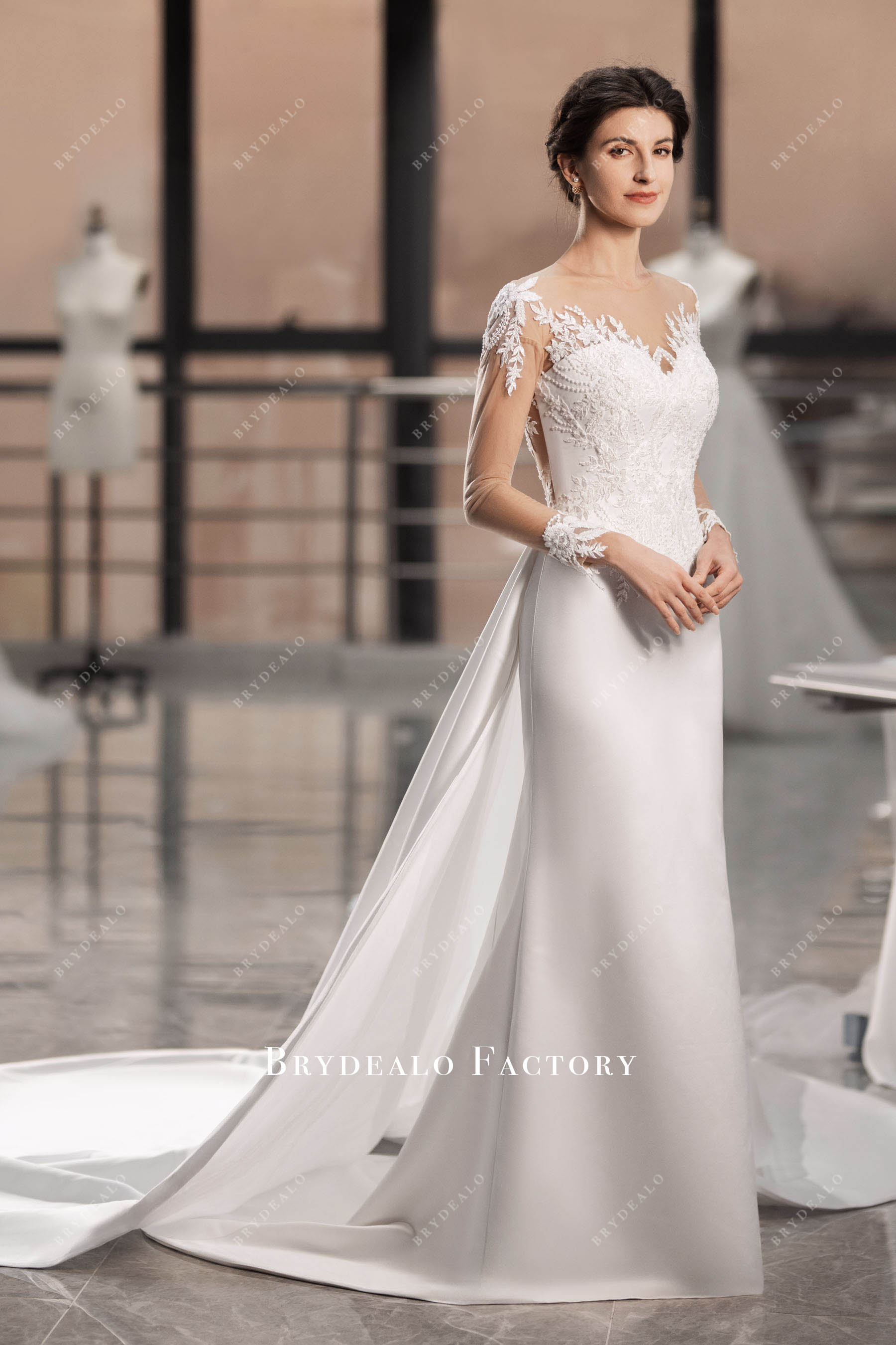 sleeved satin bridal gown