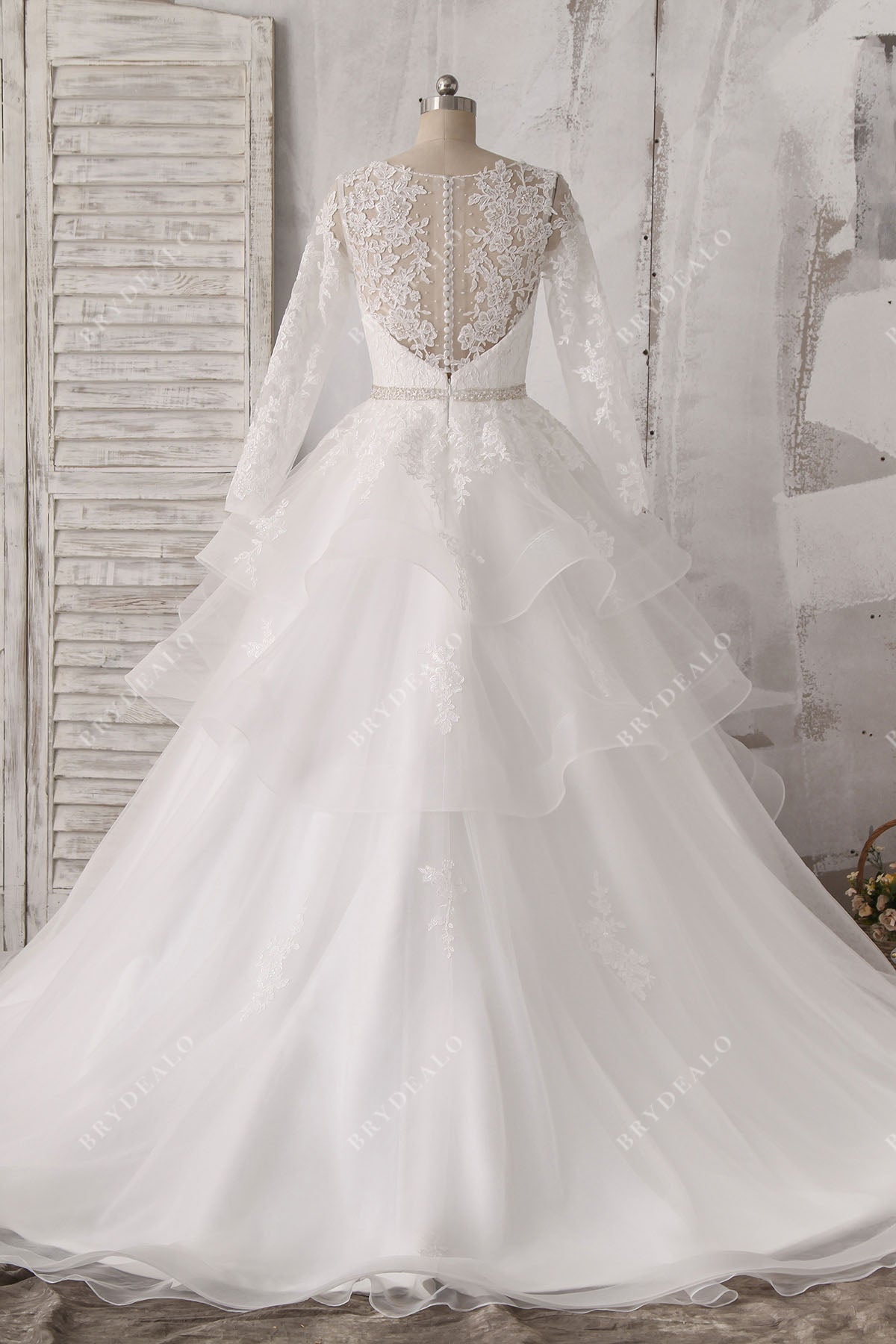 illusion back ruffled ball gown wedding dress