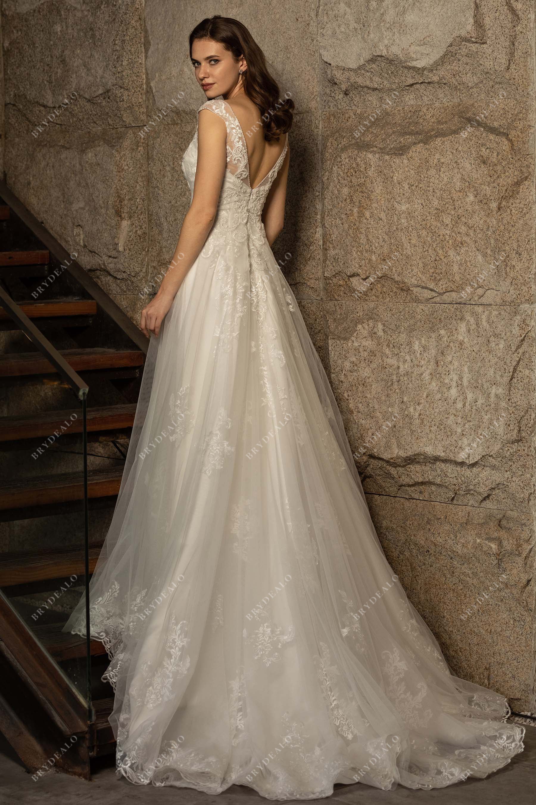 chapel train beaded sleeve lace bridal gown