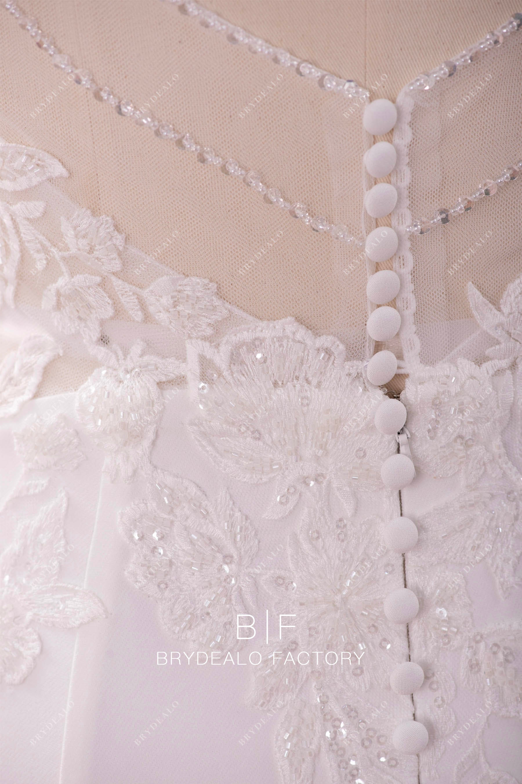 Ivory beaded lace bridal dress