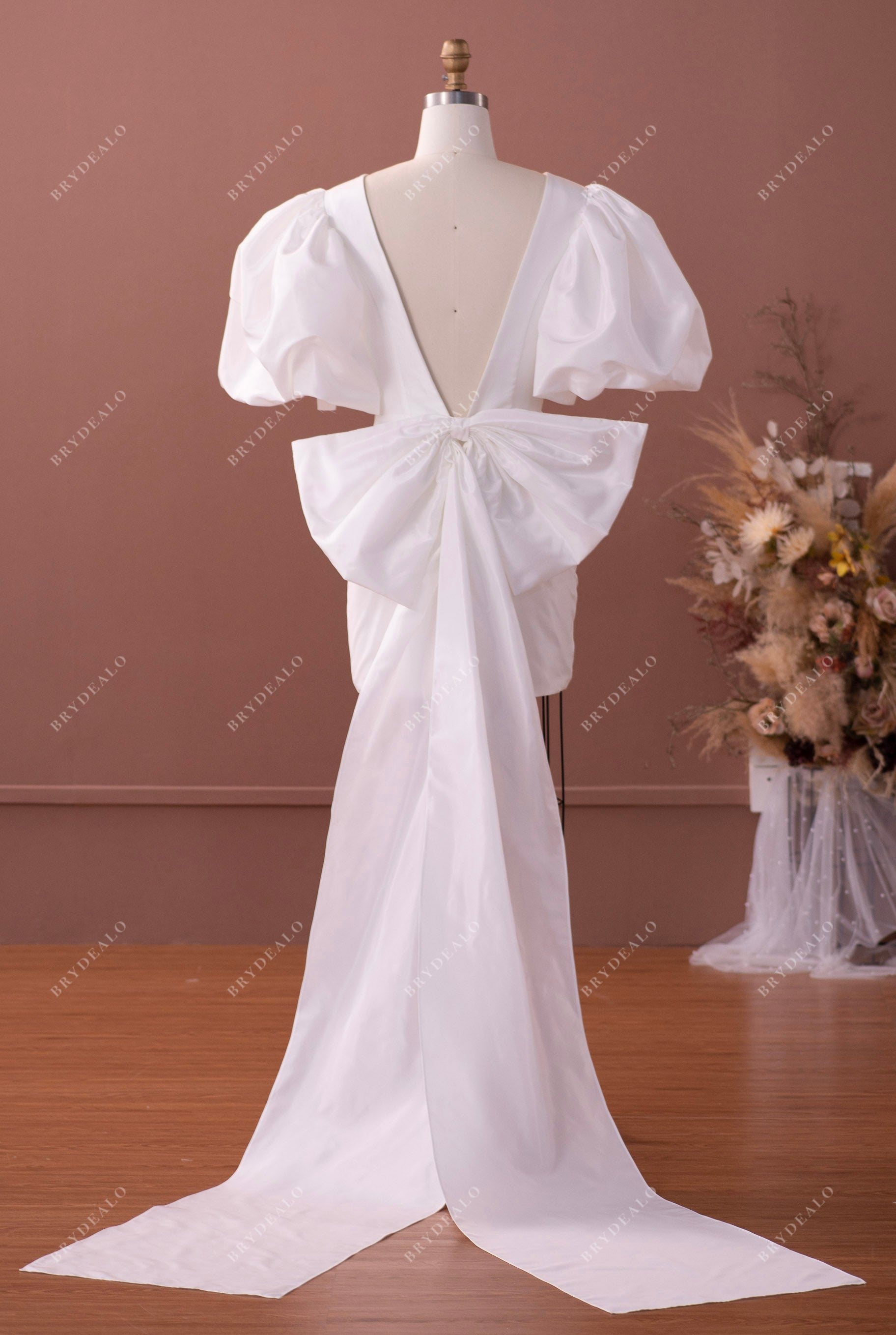 V-back big bow prom gown