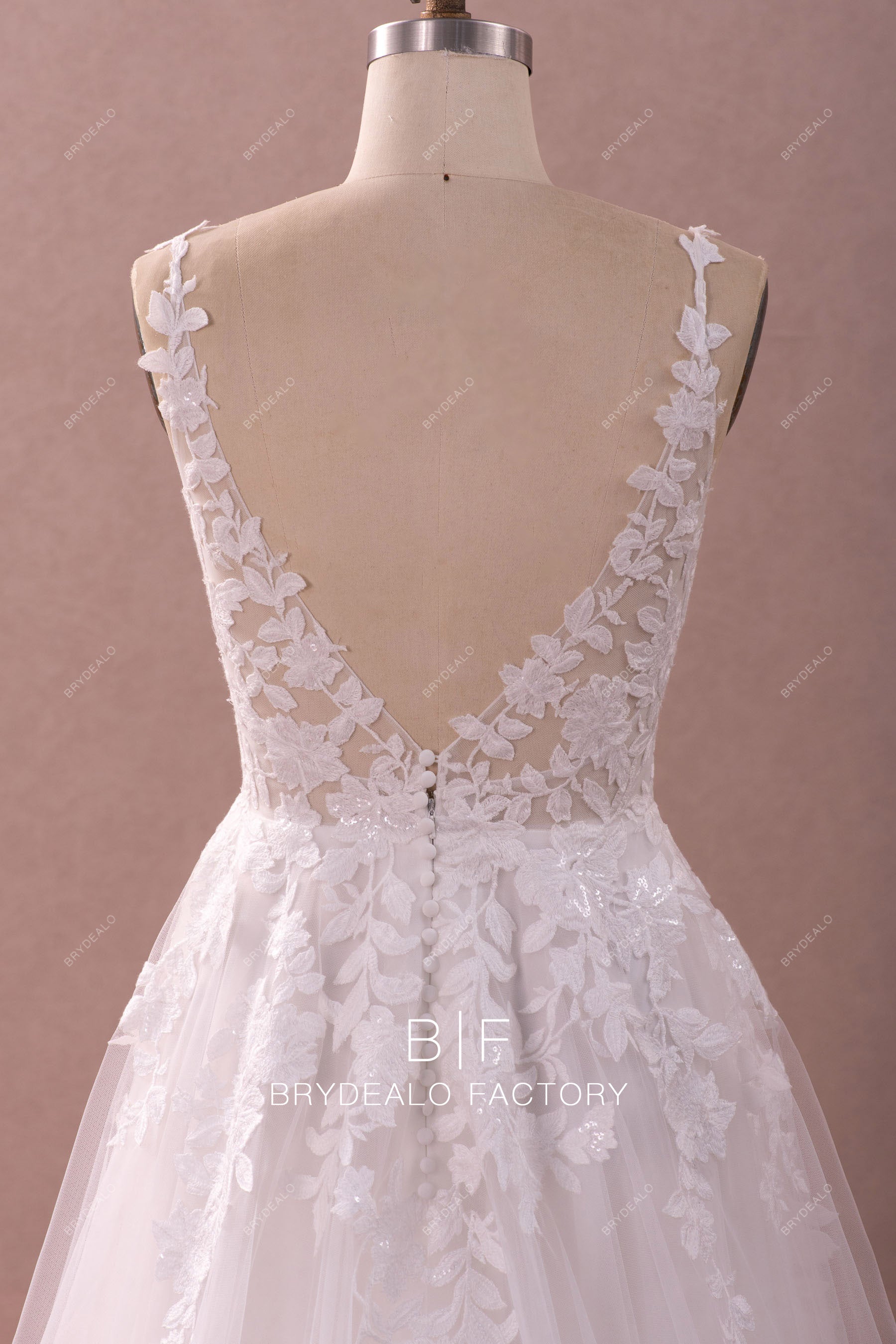 open back lace designer bridal gown