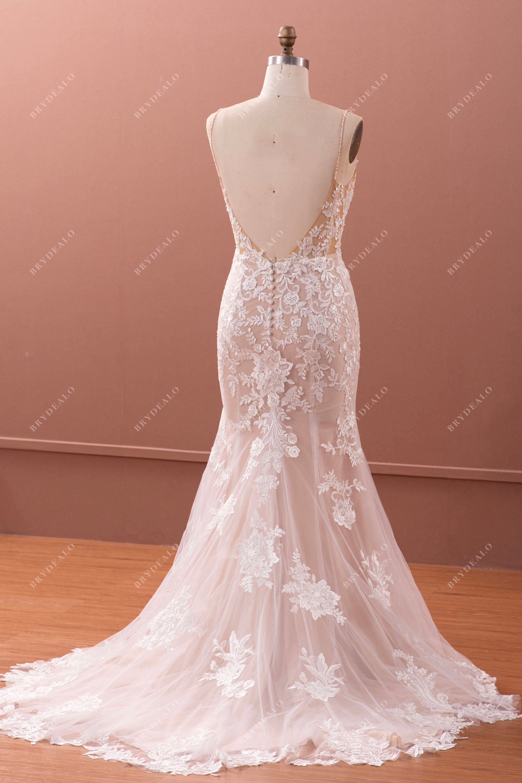 Champagne long cutout train open back bridal gown
