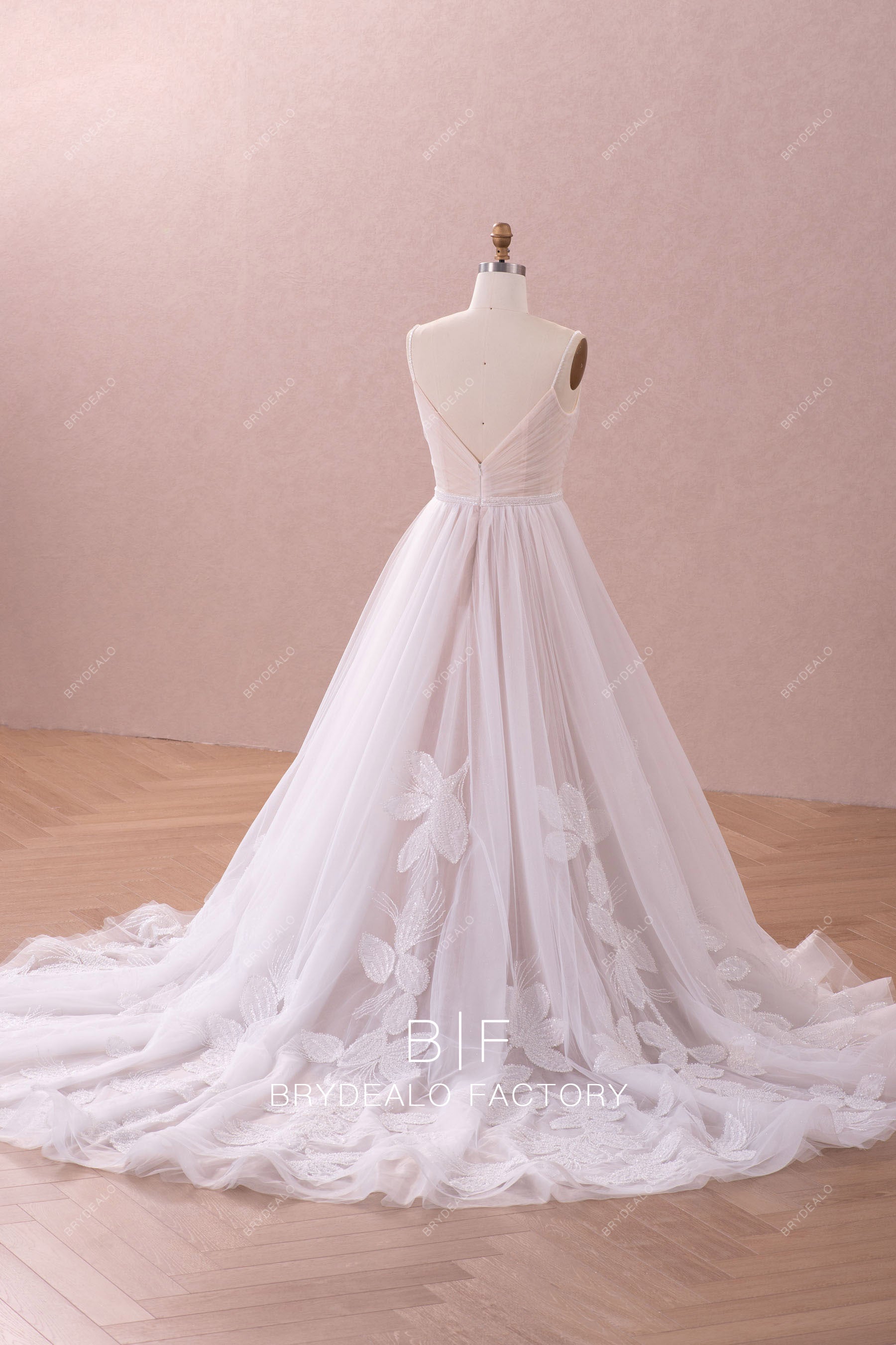Long ruffled beaded  V-back lace wedding dress