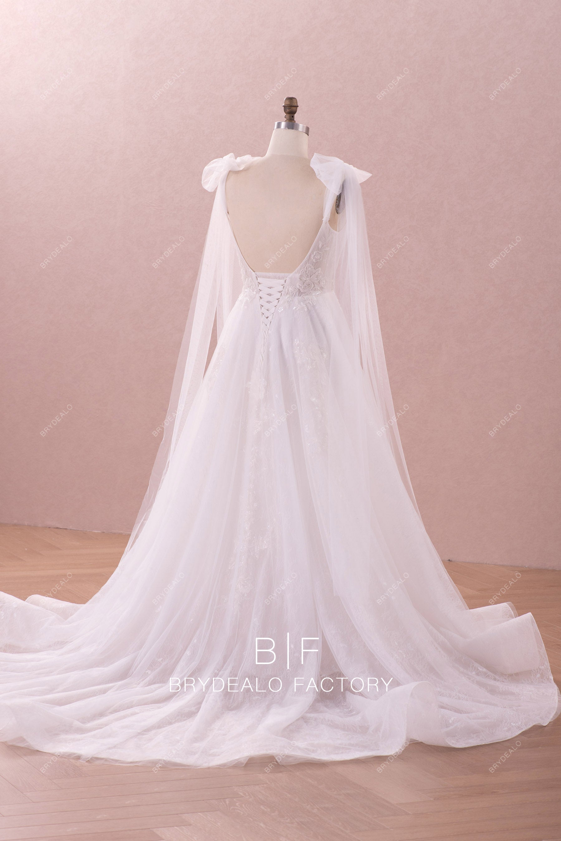 ruffled open back court train lace wedding dress