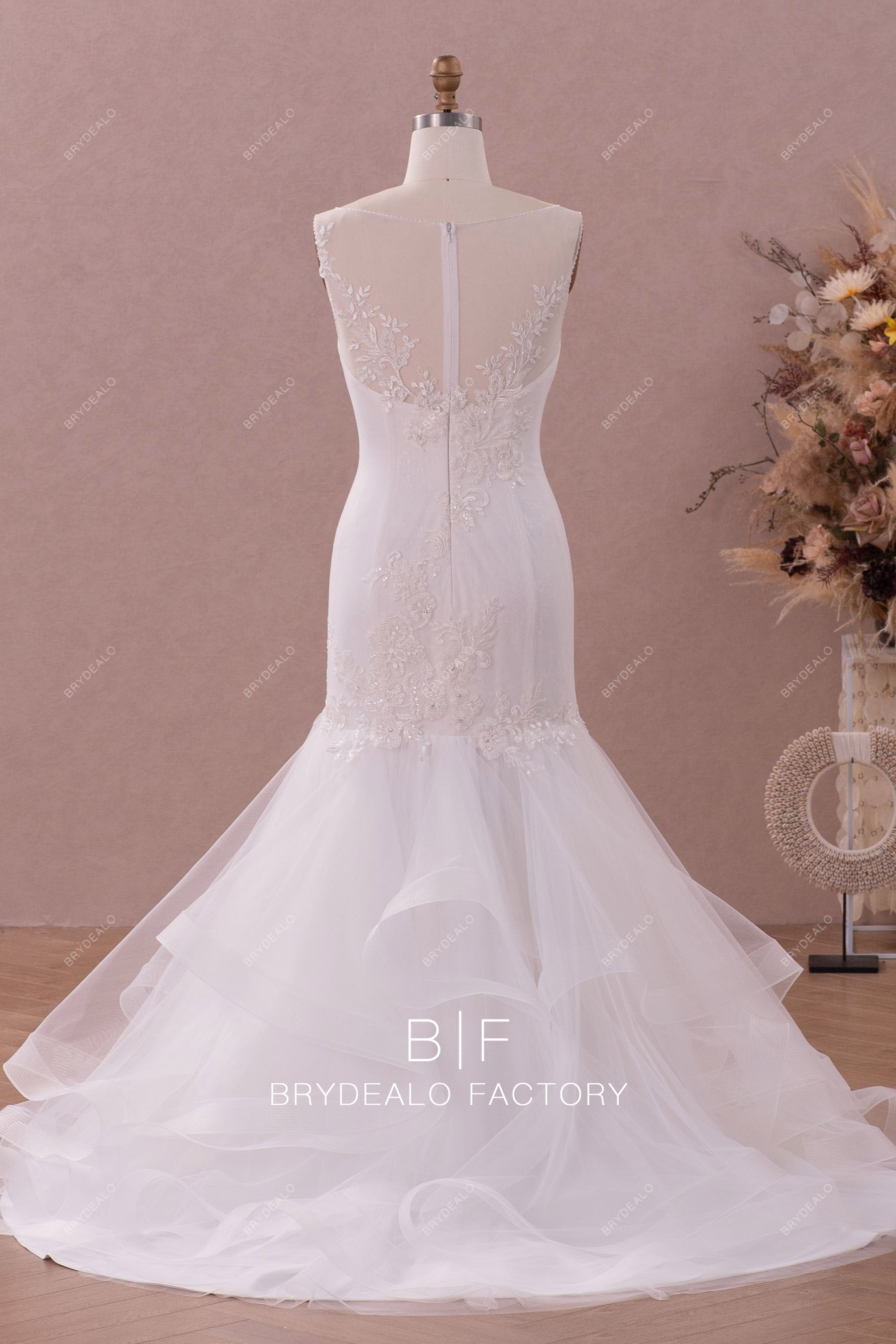 long ruffled train trumpet designer wedding gown