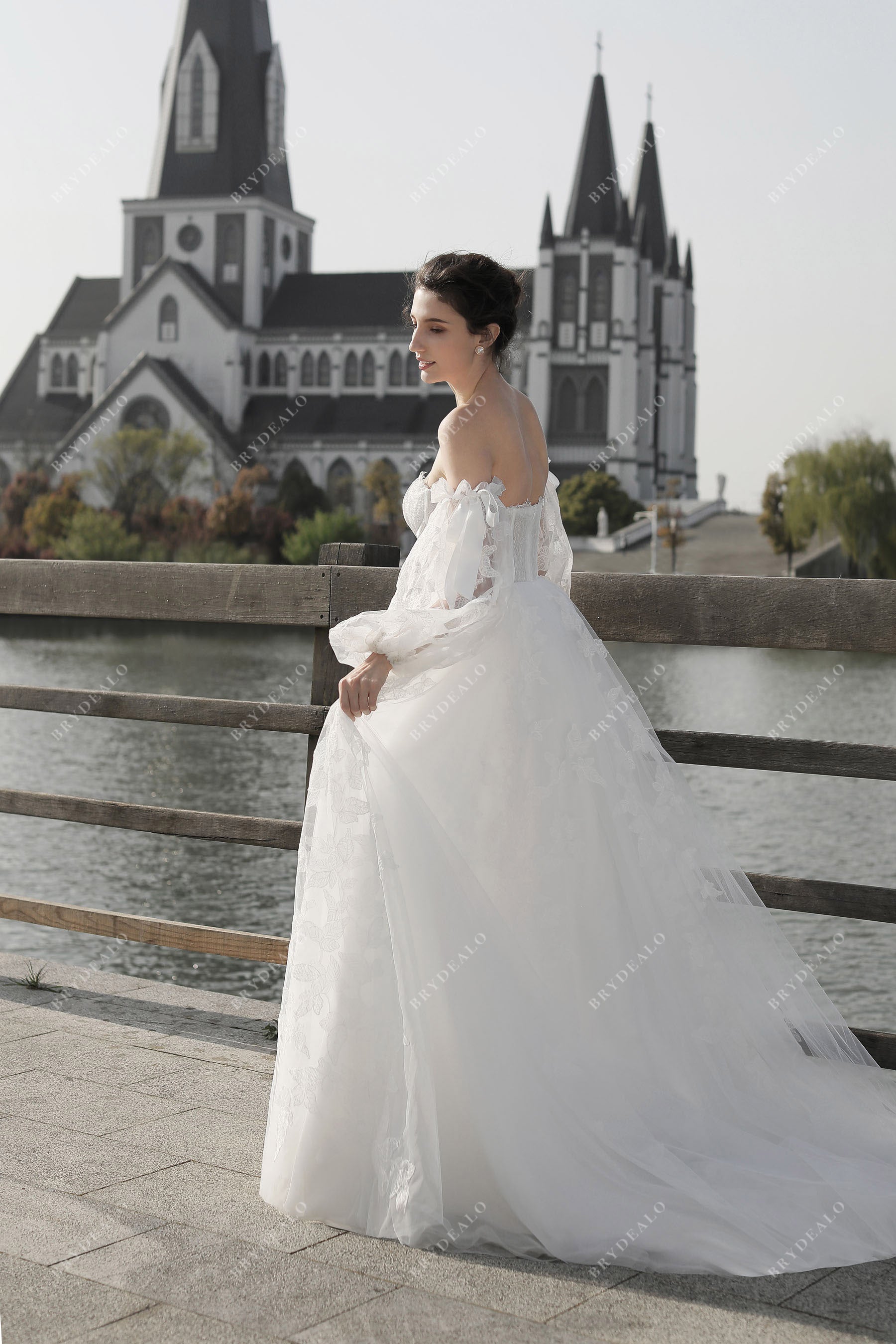 bell sleeve lace applique wedding dress