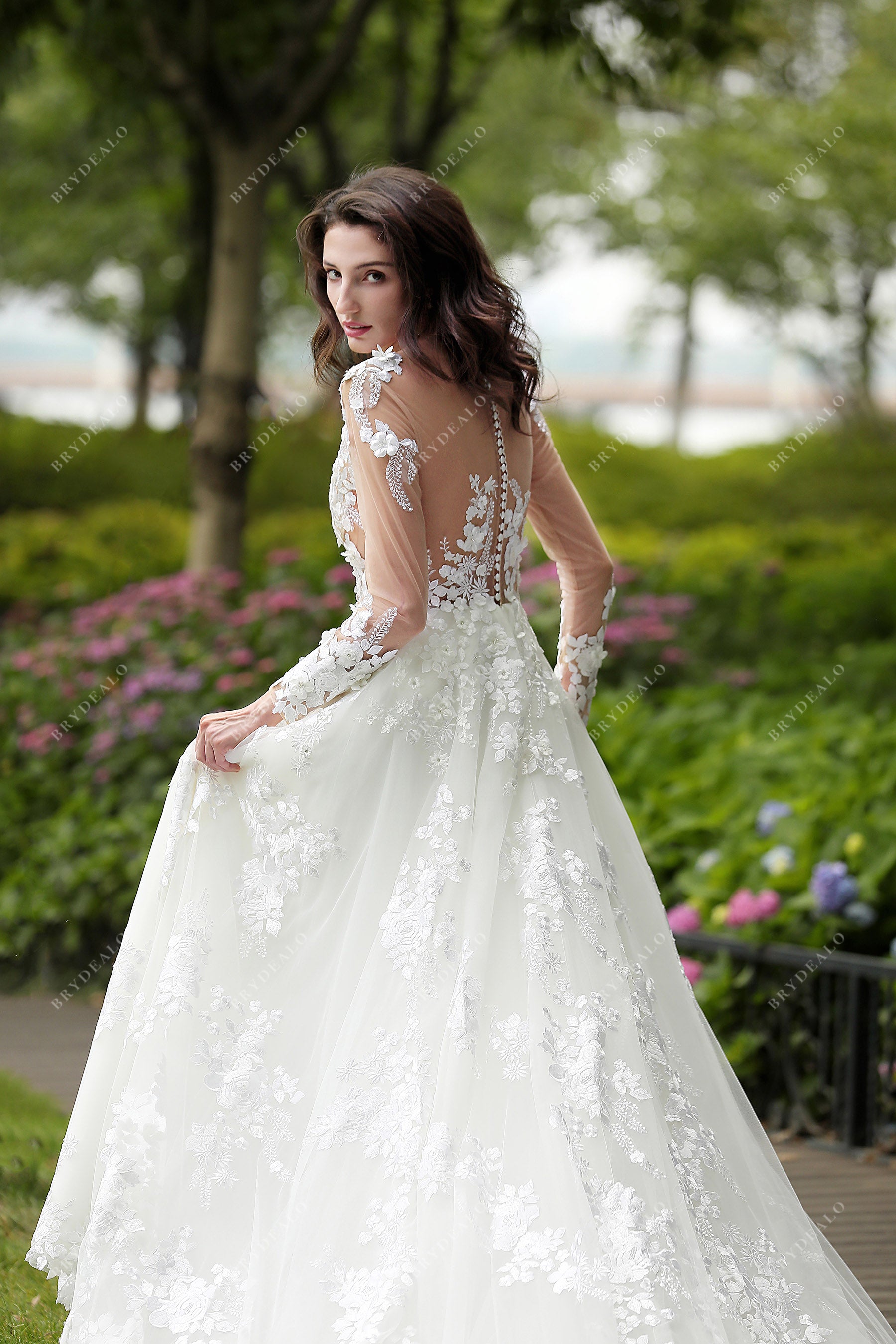 illusion back lace long sleeved bridal dress 