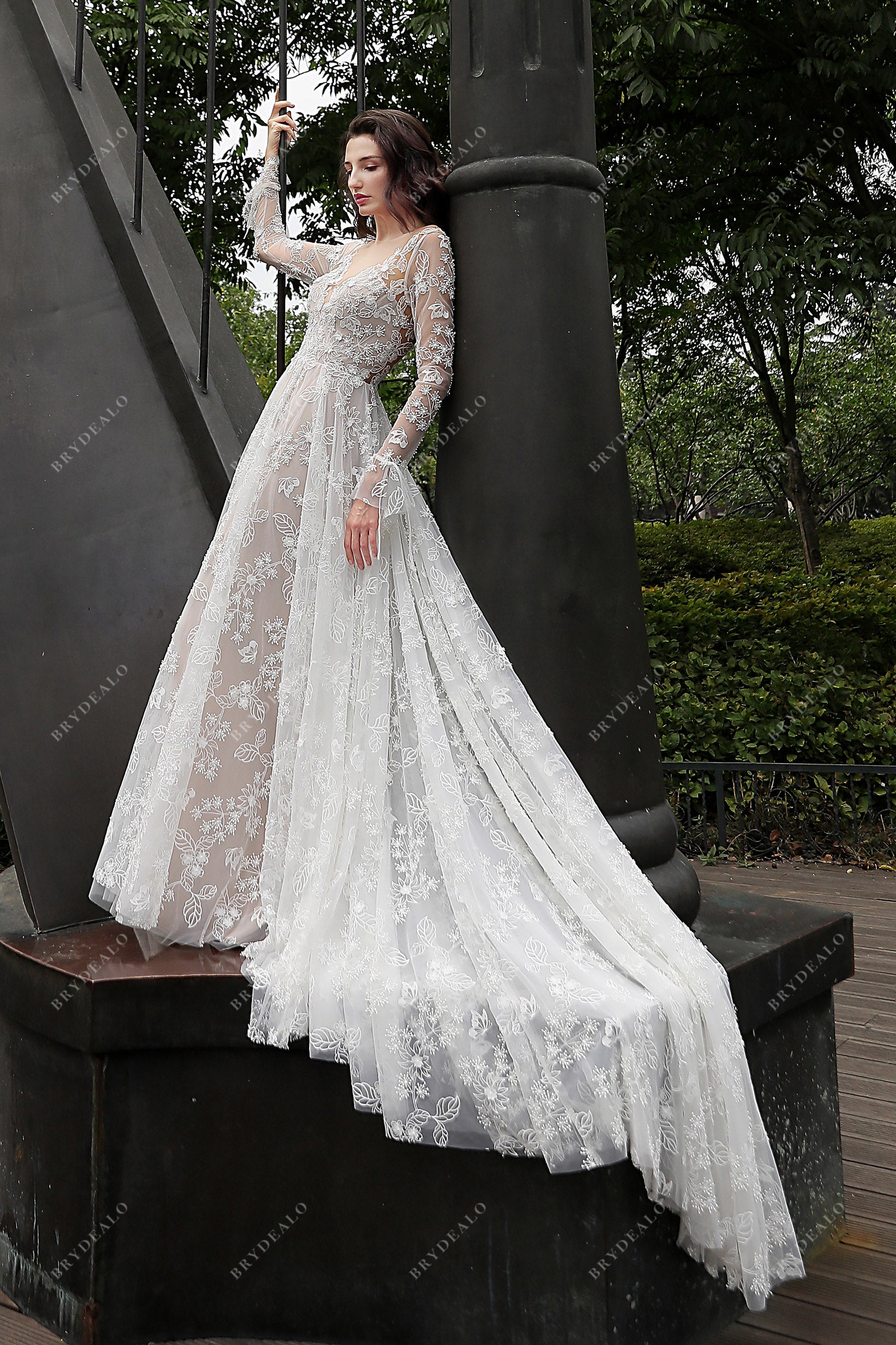 long sleeved lace long train wedding dress