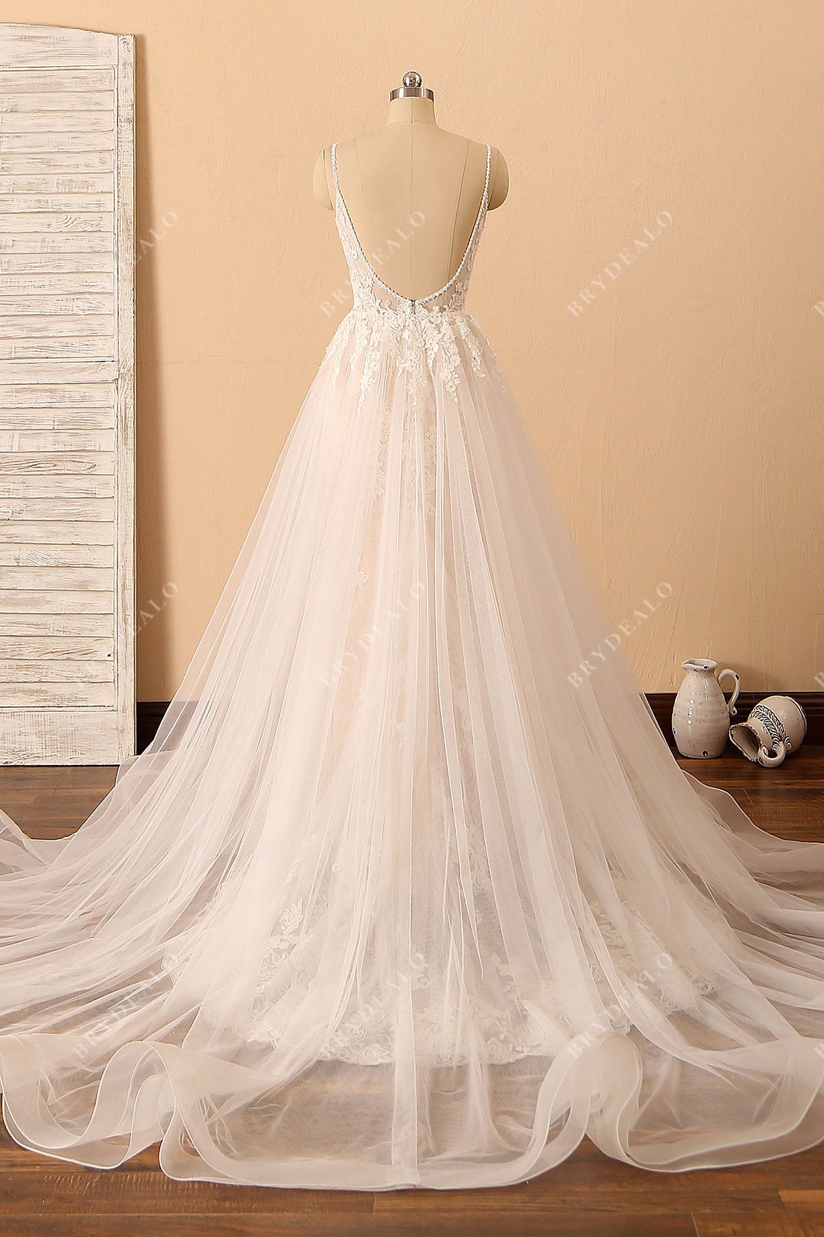 open back tulle overskirt wedding dress