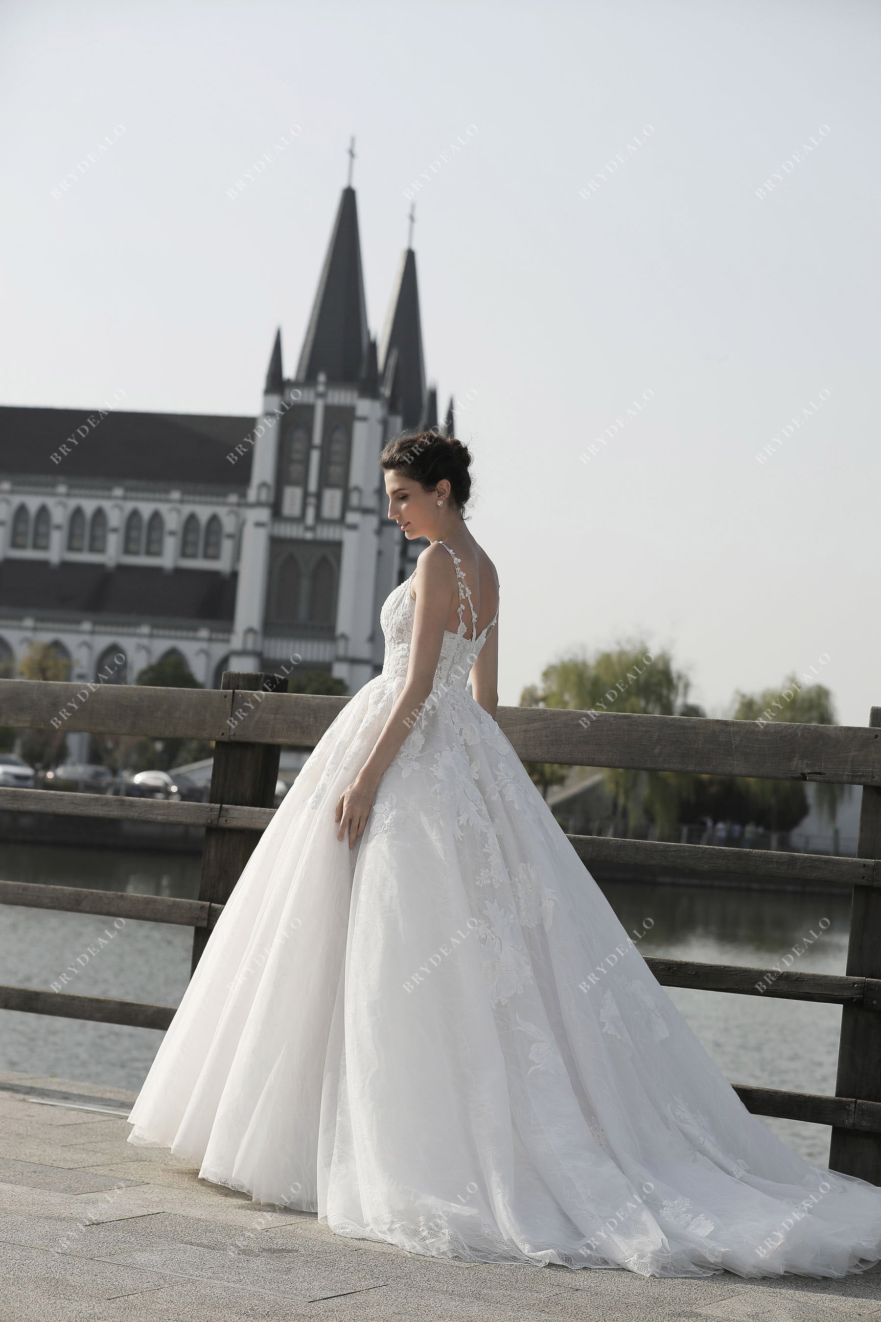 spaghetti strap tulle long train wedding dress