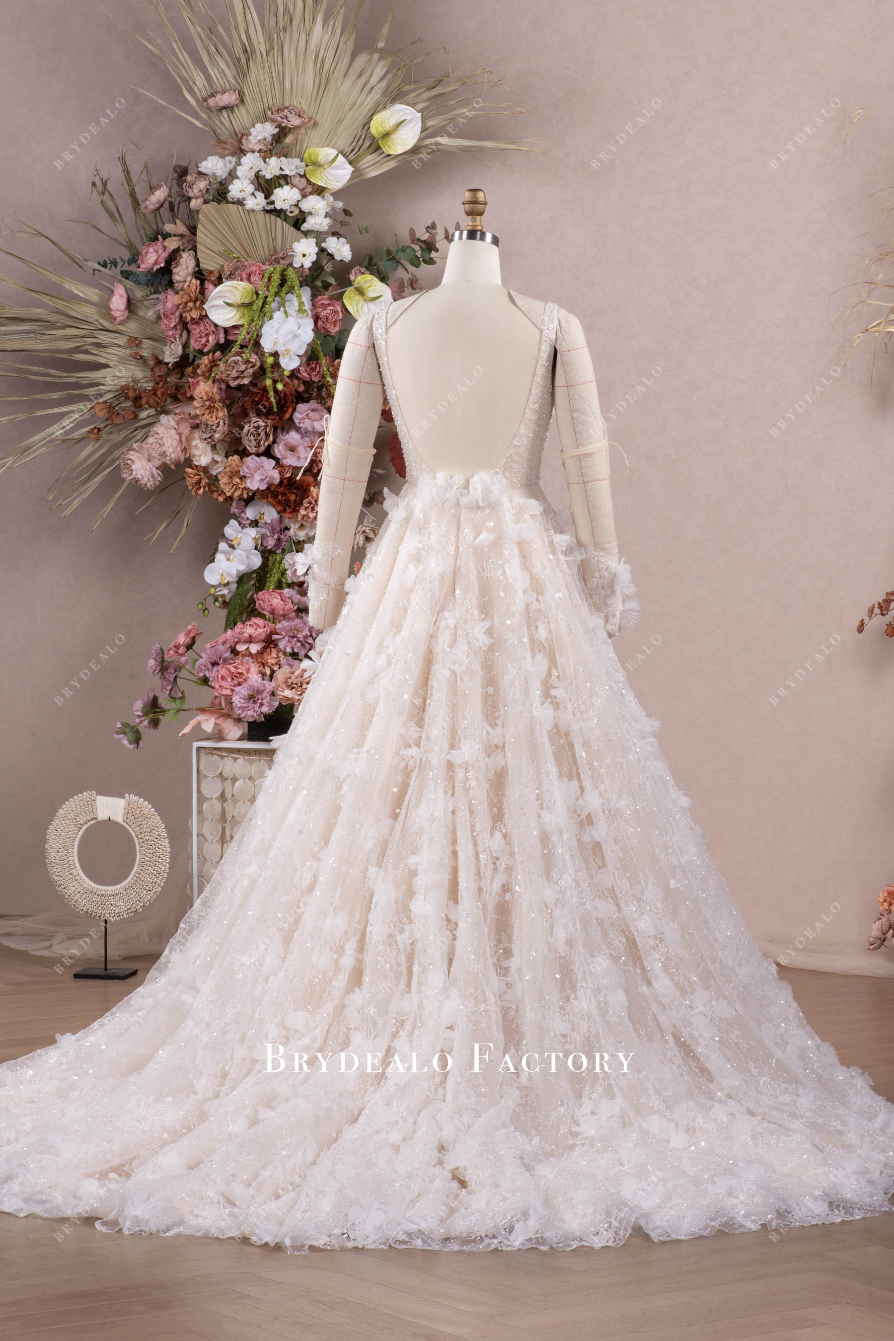 V-cut back lace wedding gown
