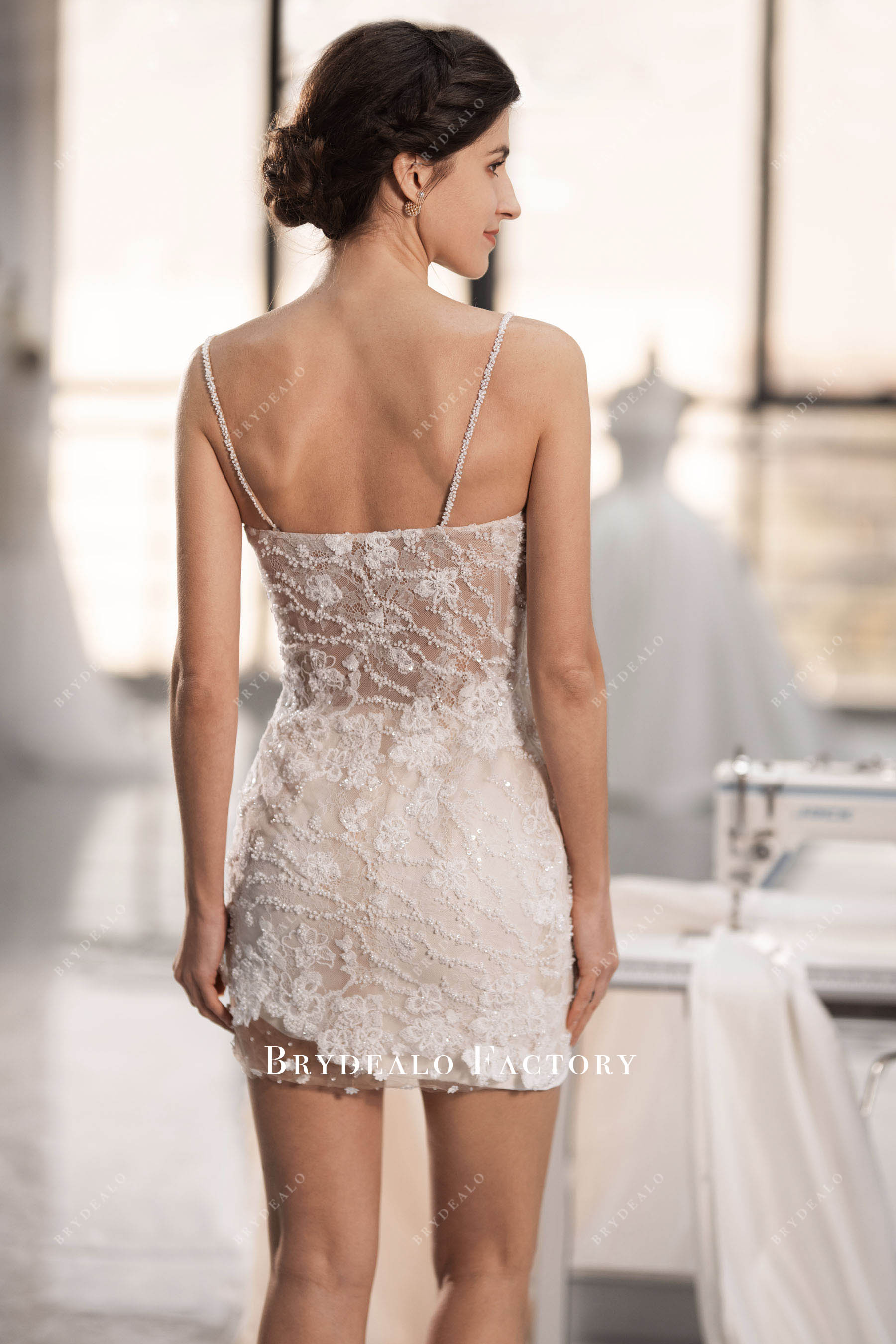 open back designer lace wedding gown