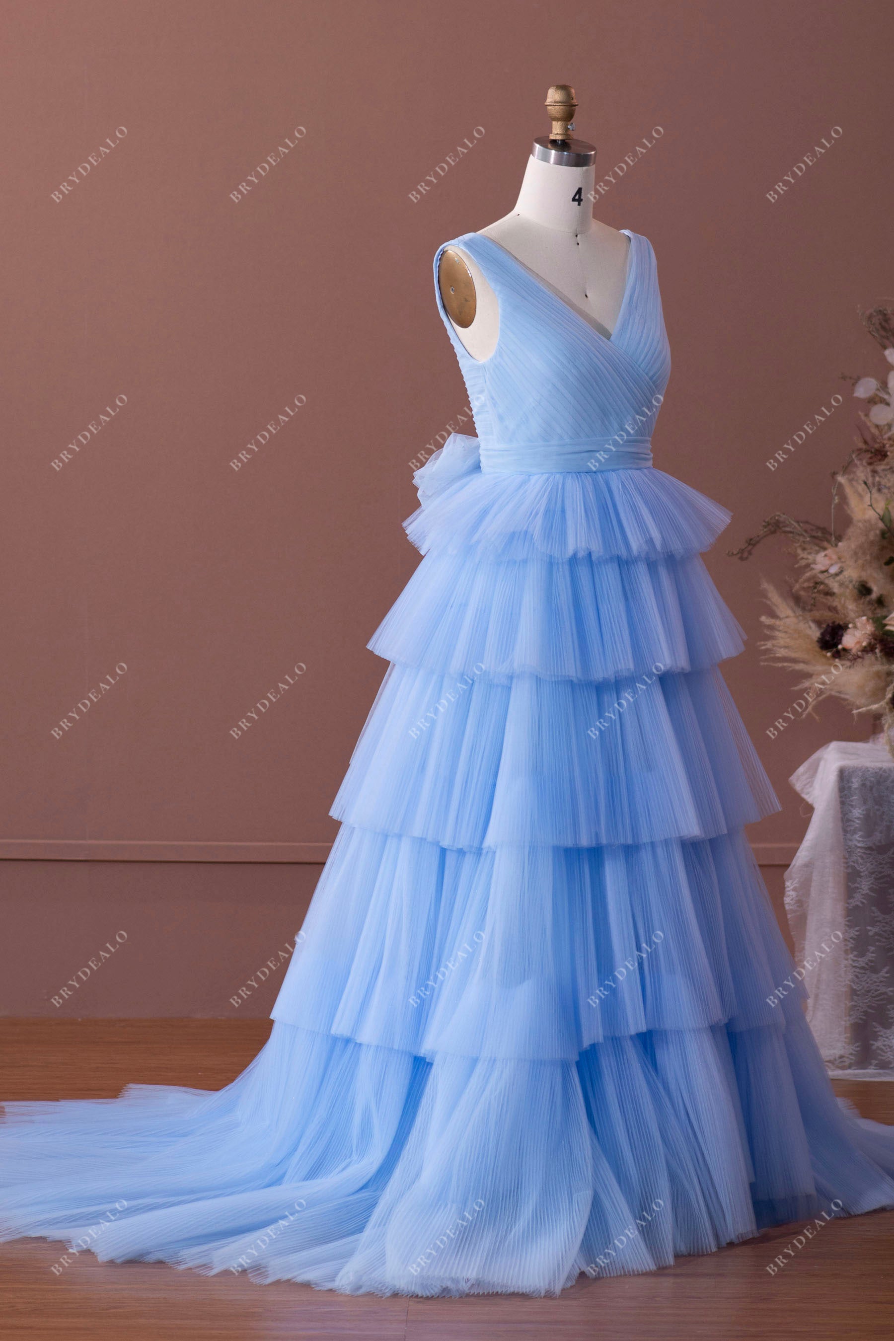 sleeveless blue tulle tiered formal dress