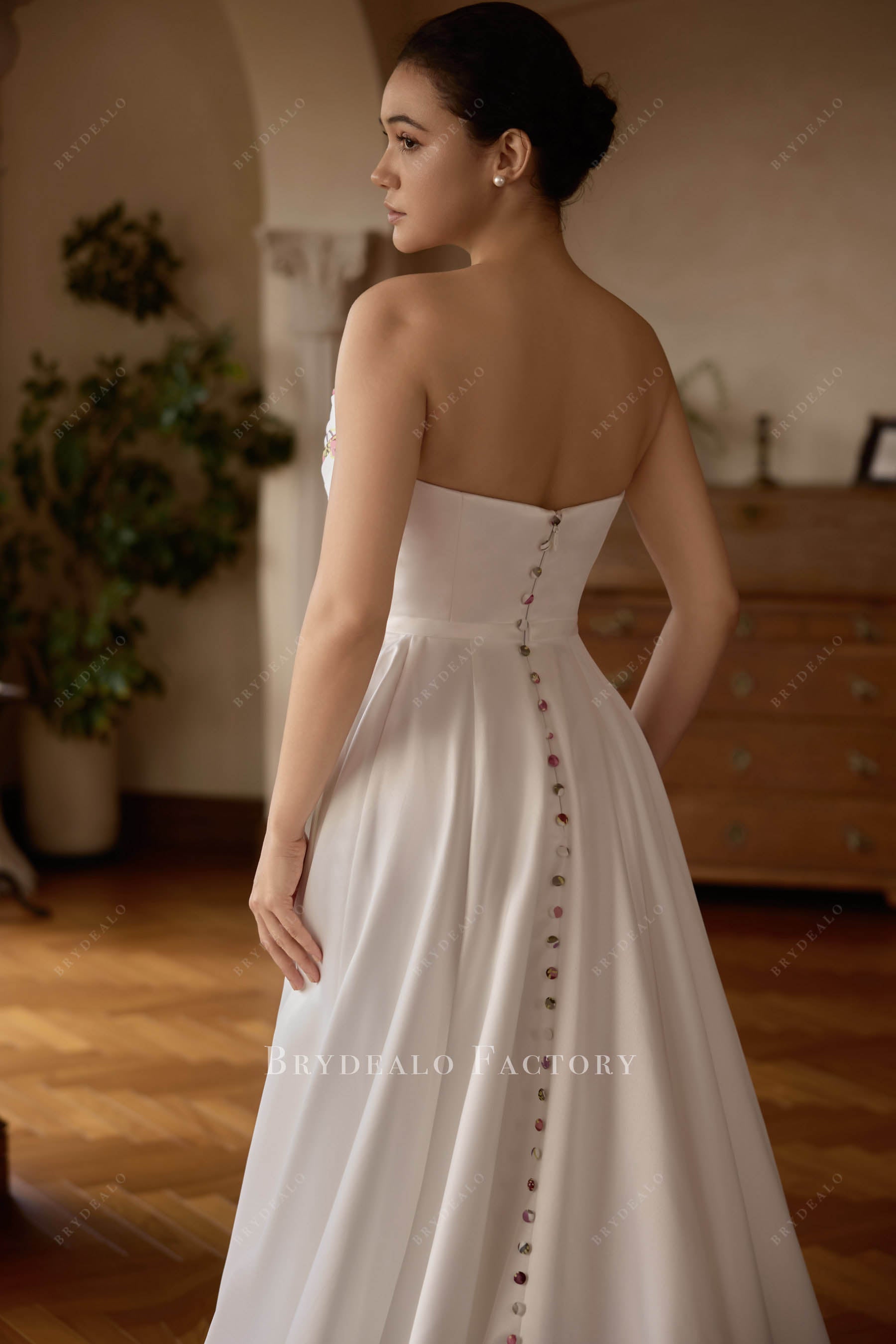 buttoned back wedding gown