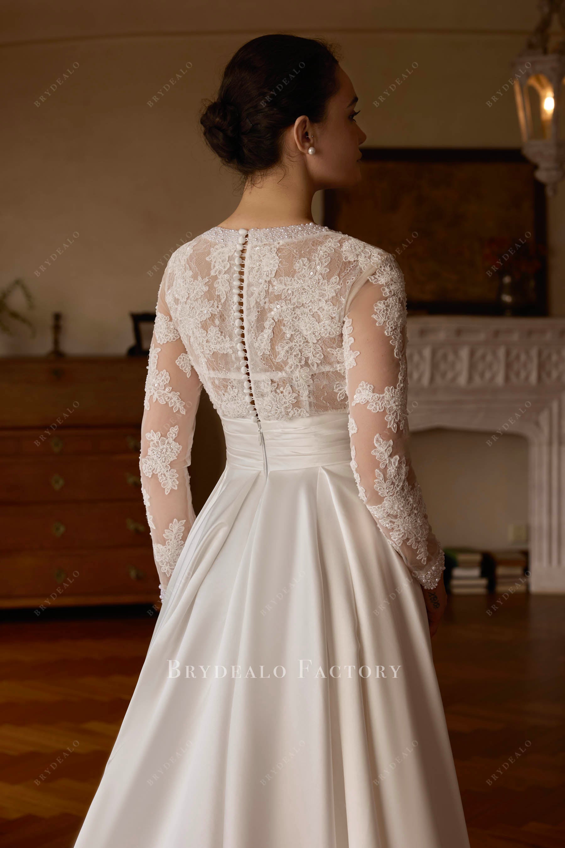 buttoned lace back bridal dress