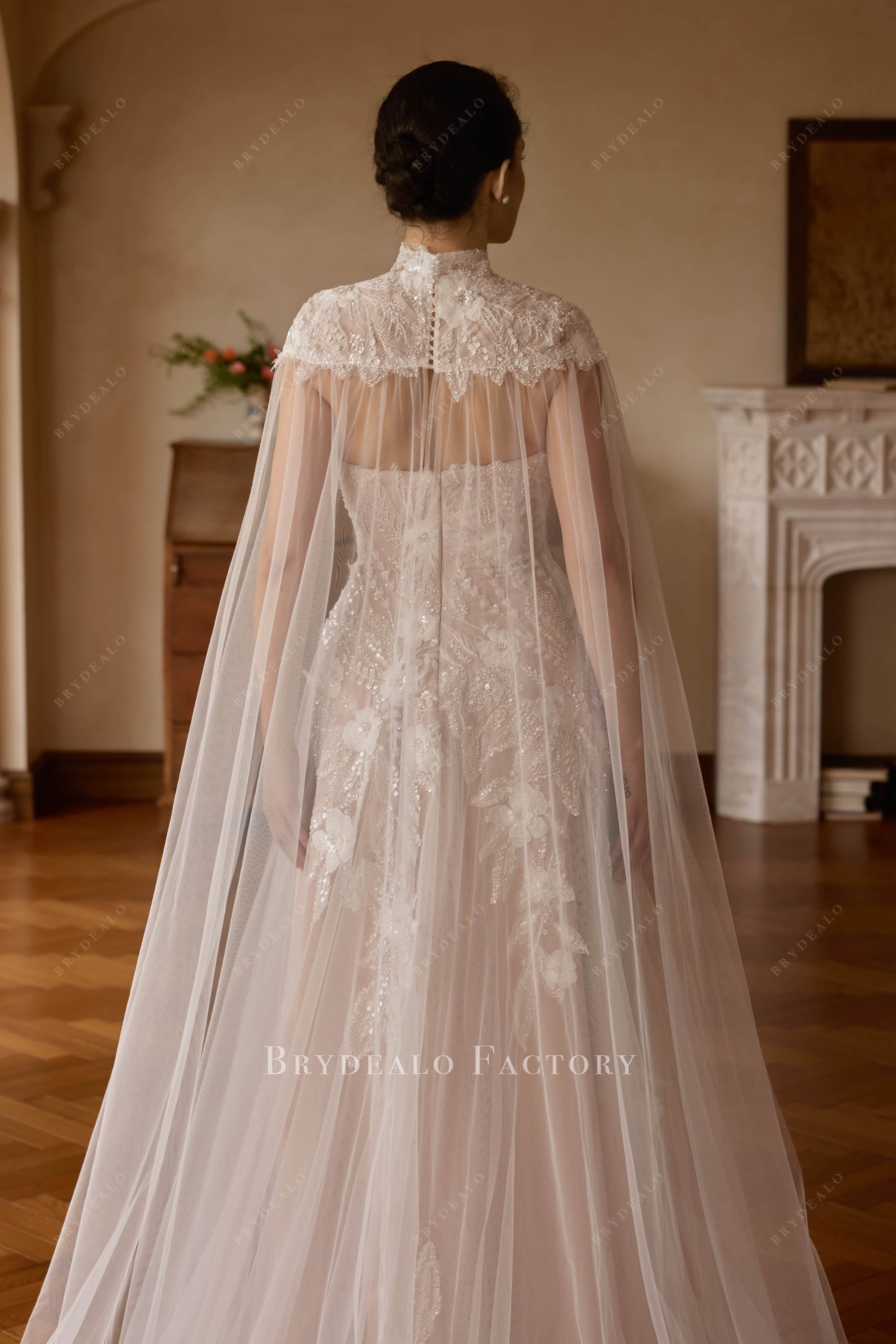 crystal button illusion cape bridal gown