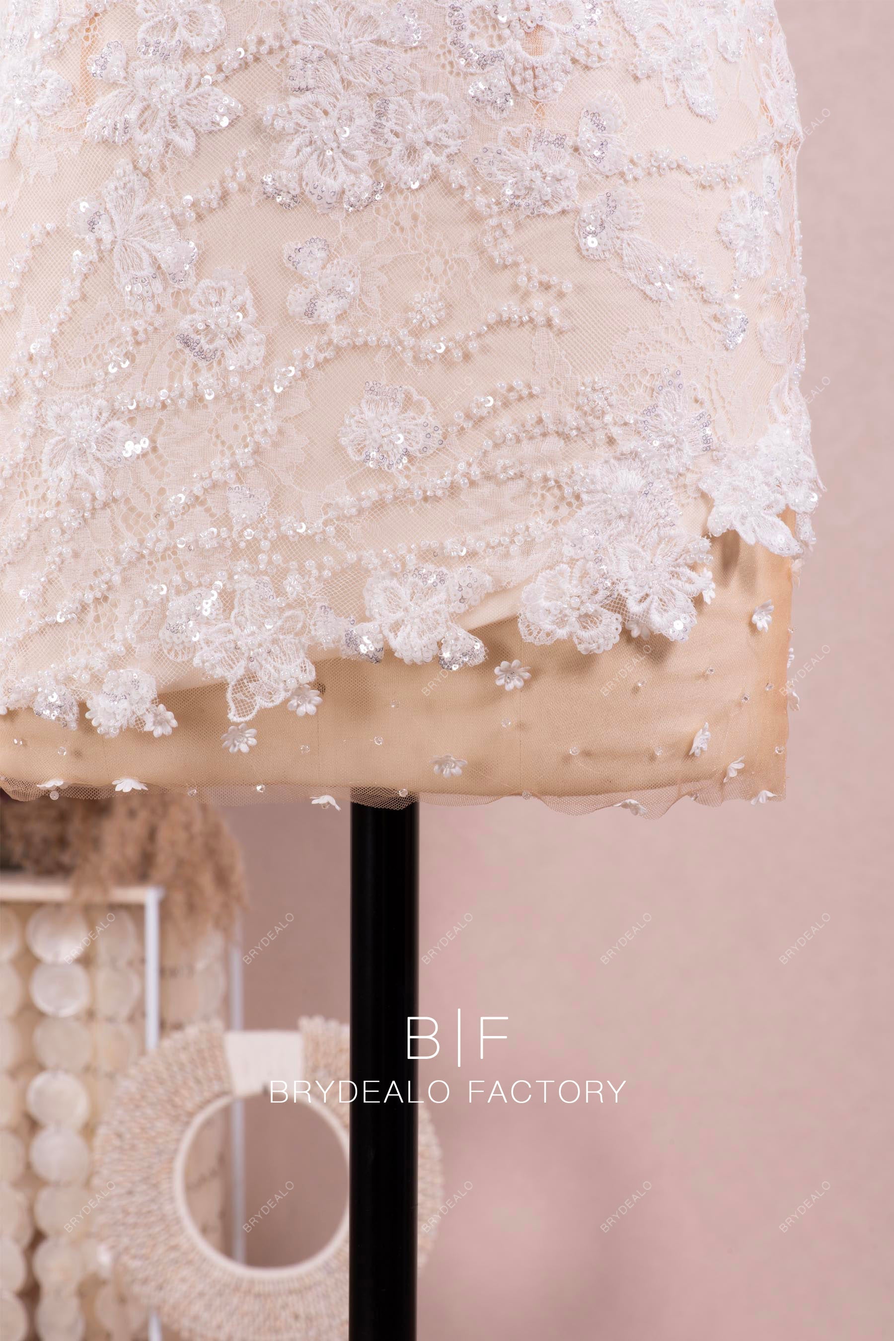 delicate flower beading details of bridal dress