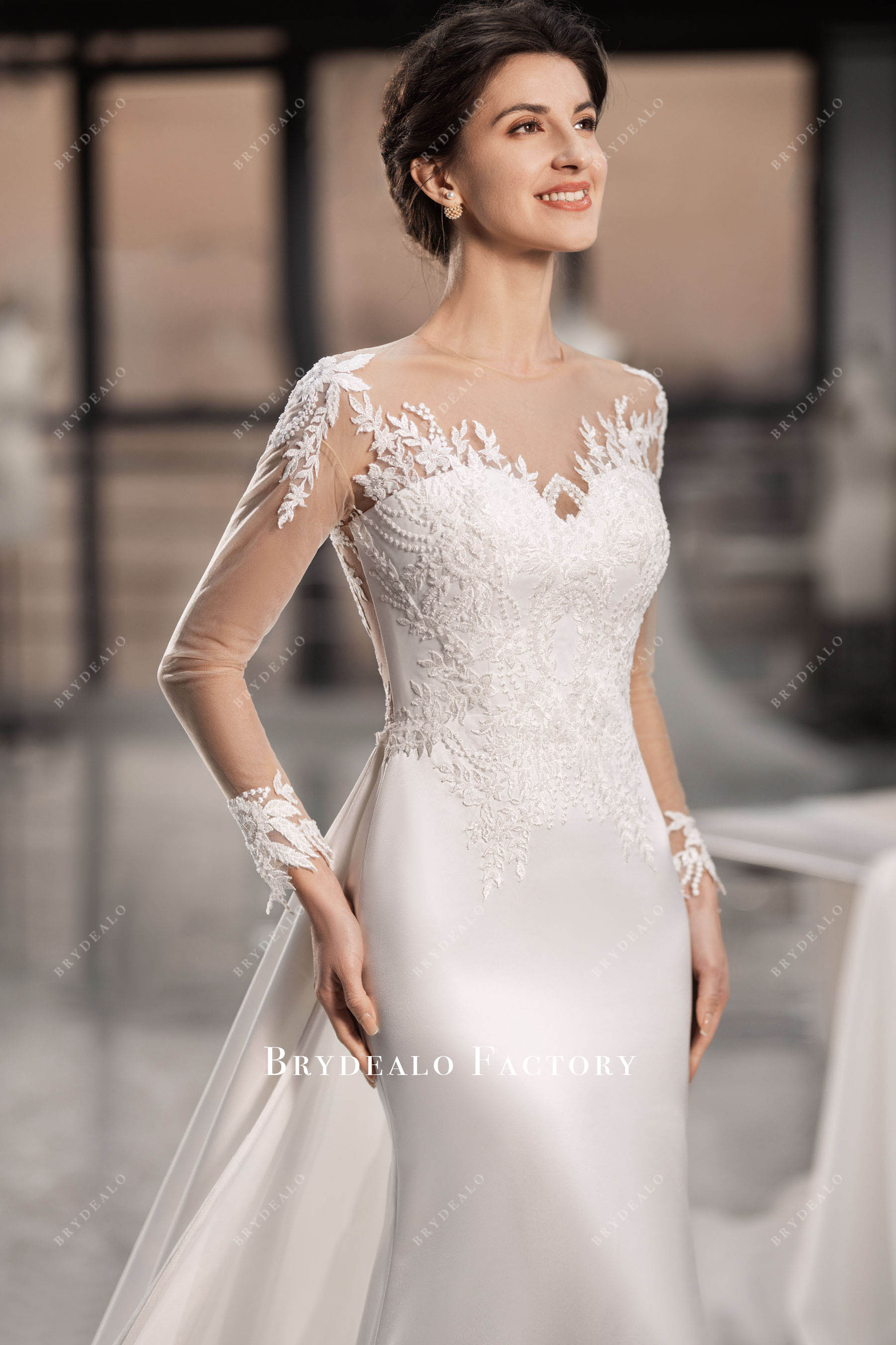 elegant beaded sleeved wedding dress