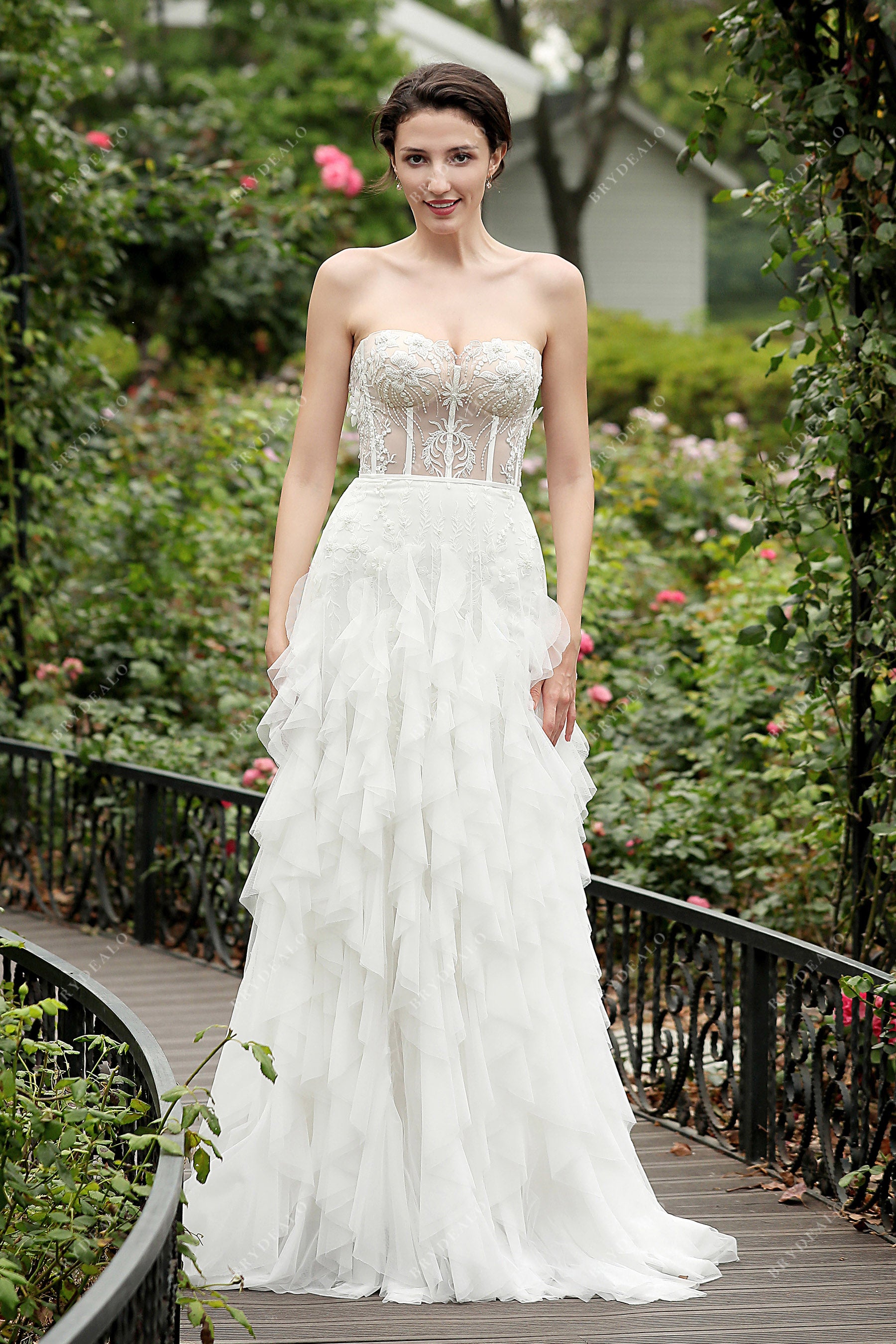 strapless ruffled overskirt A-line wedding dress