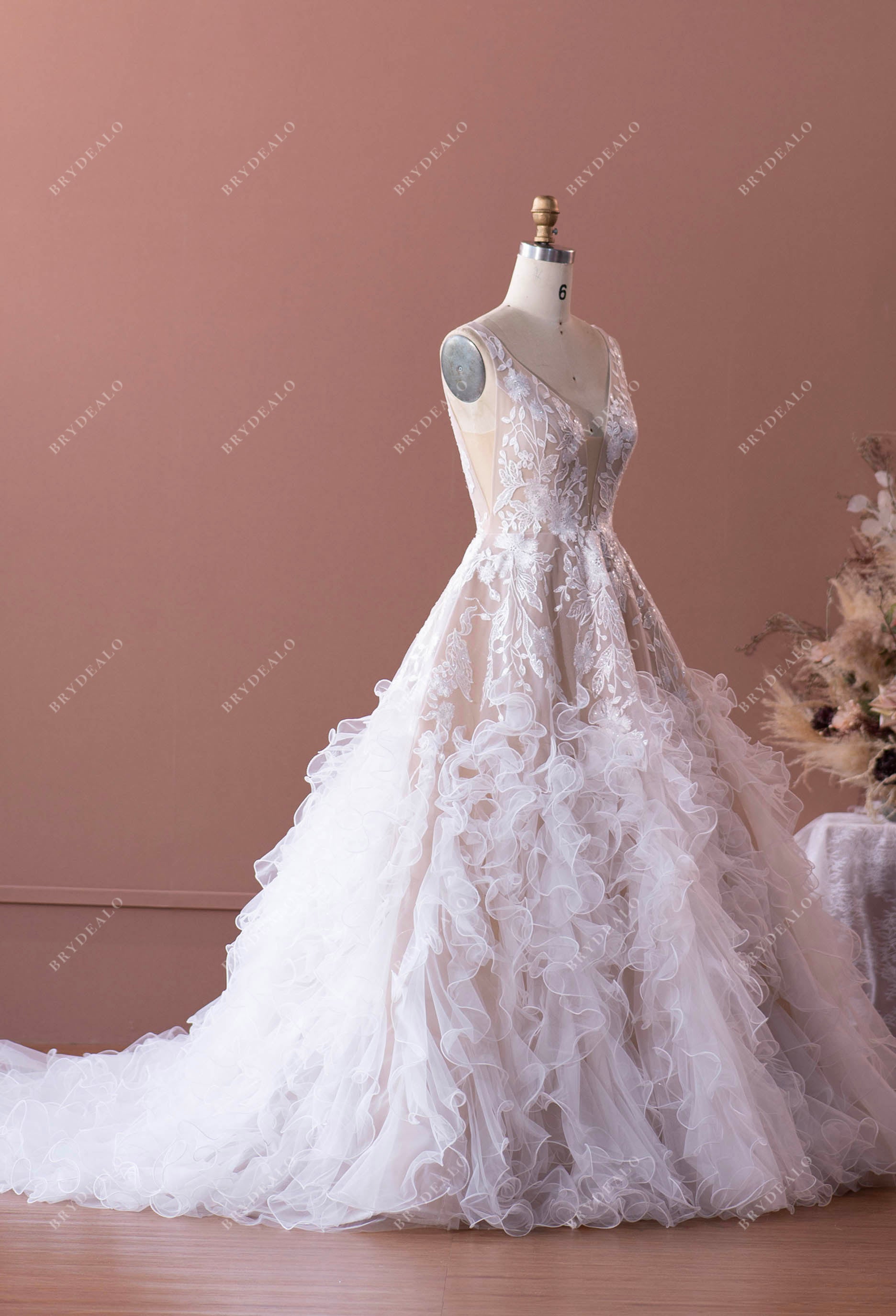 lace applique ruffled ballgown wedding dress