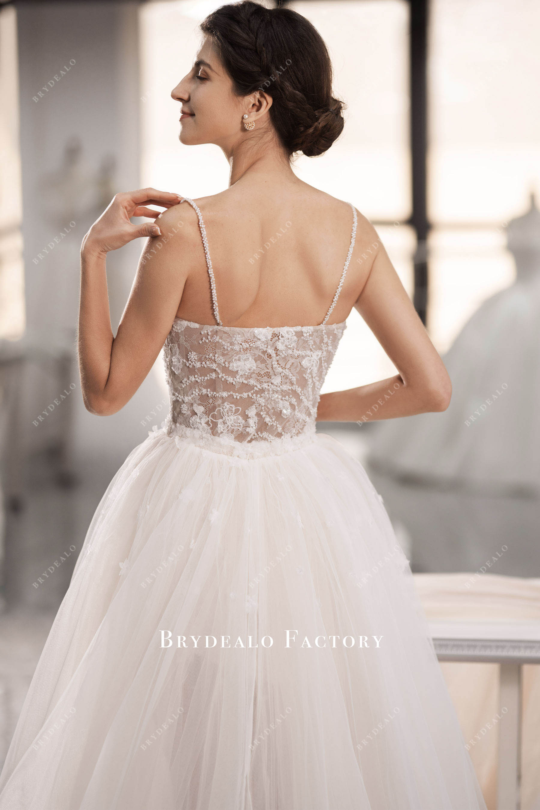 hand-sewn beaded straps wedding dress