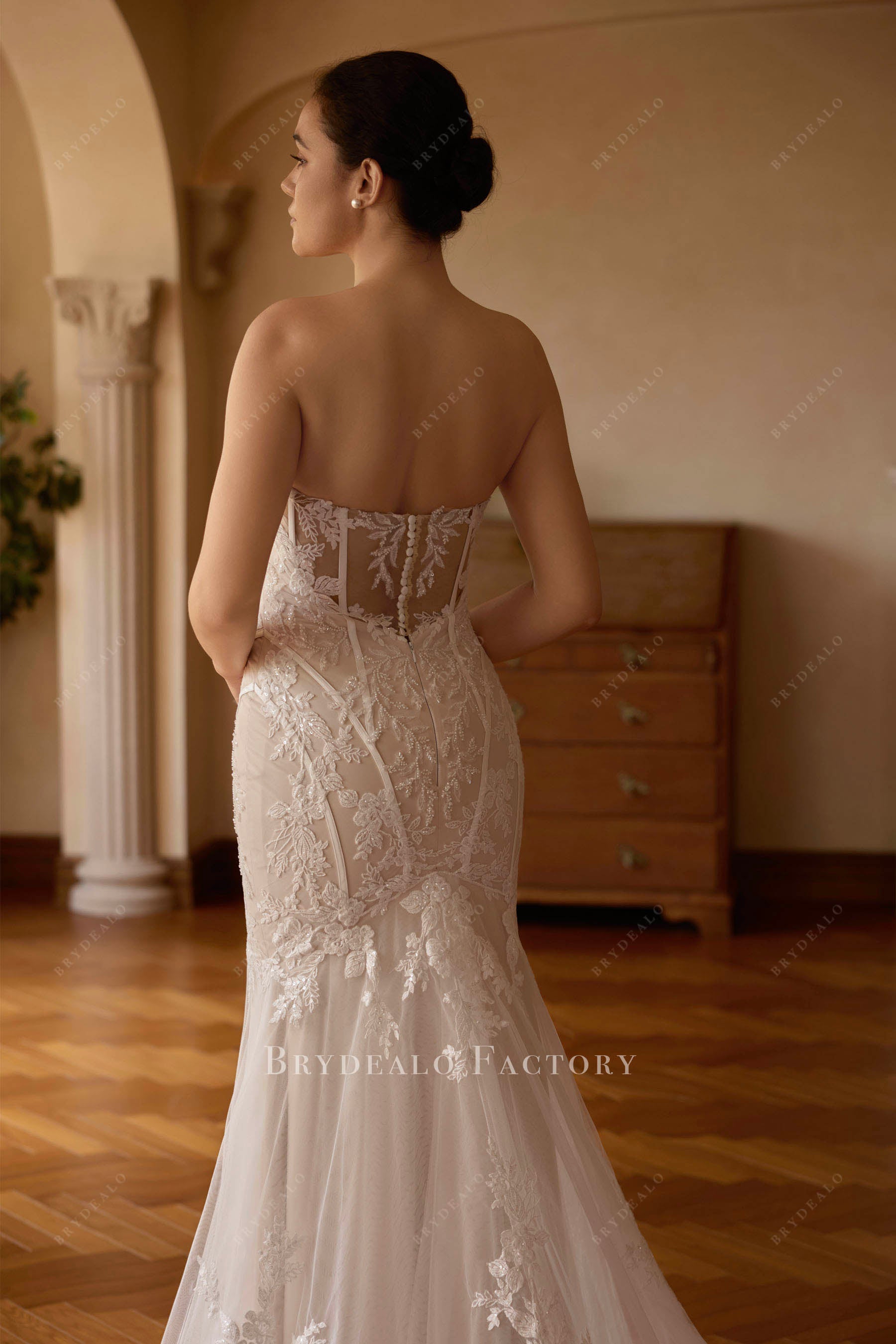 illusion buttoned back bridal dress