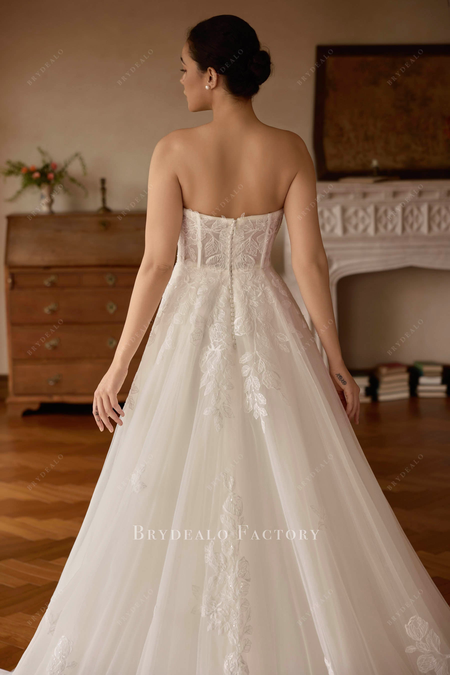 illusion buttoned back bridal dress