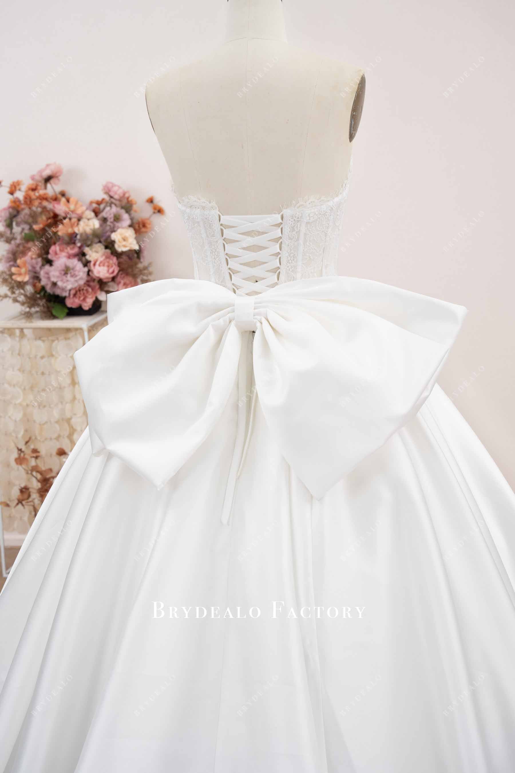 large bow lace-up back wedding gown