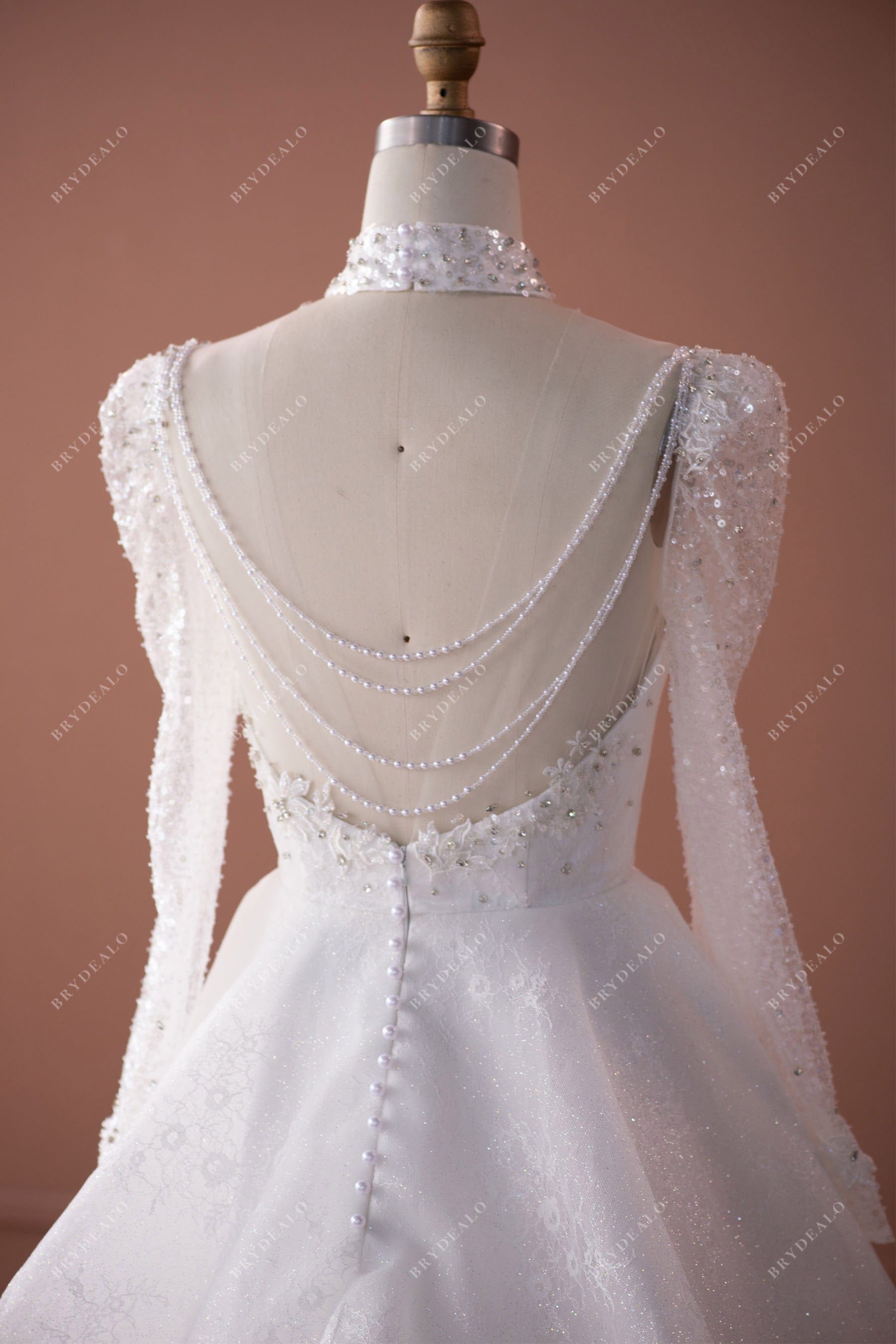 pearl chain back long sleeves wedding dress