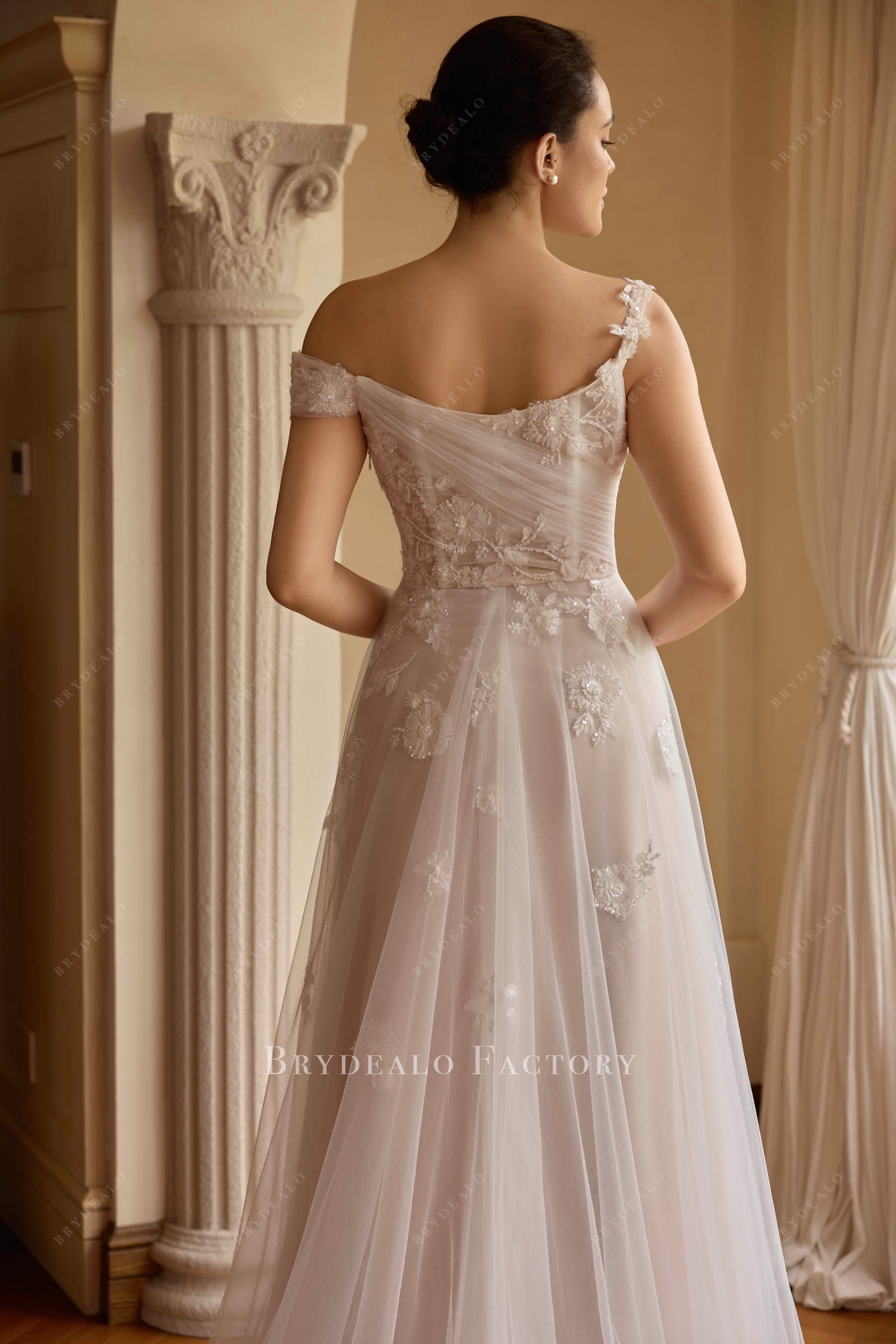pleated tulle bridal dress