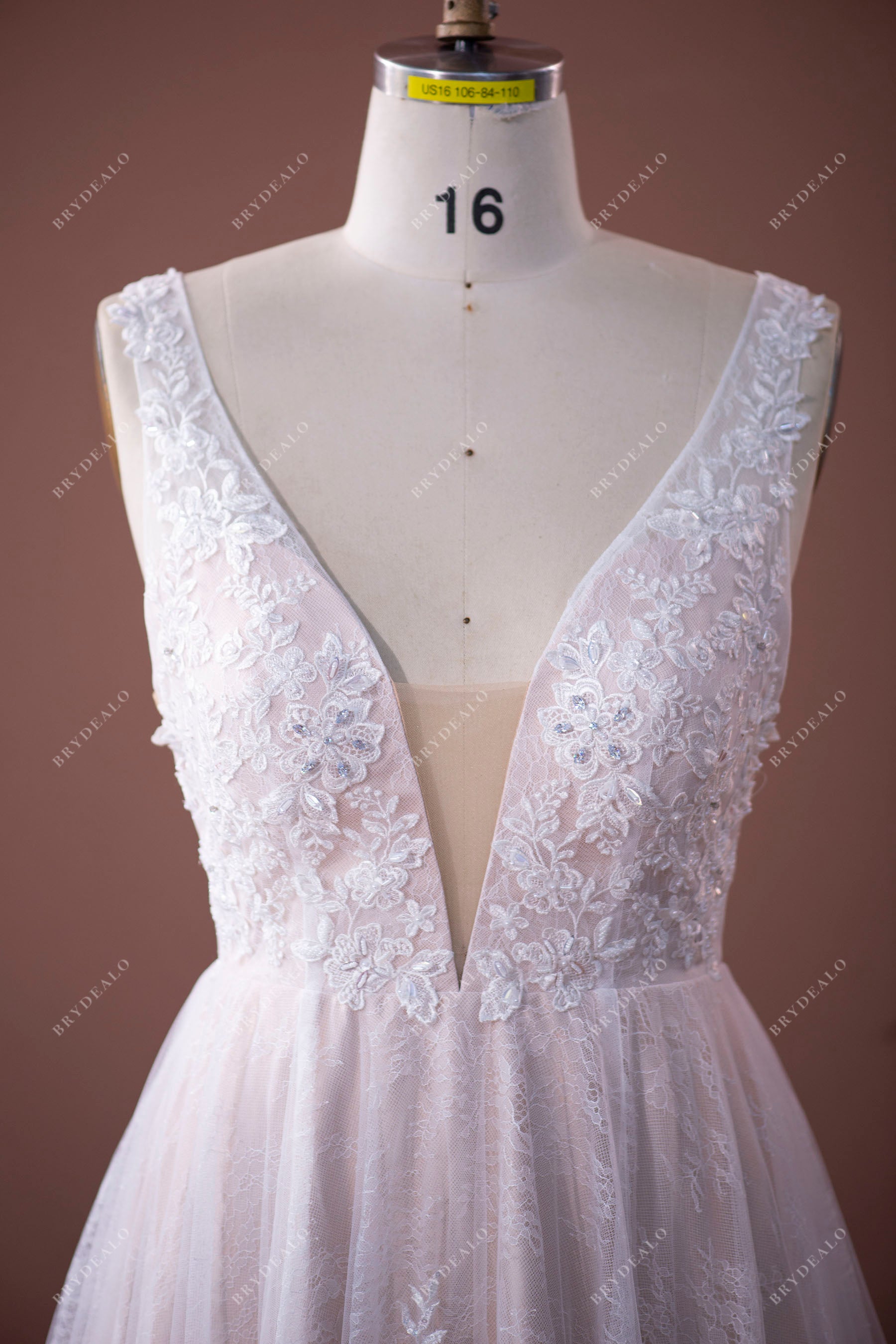 sleeveless beaded lace applique wedding dress