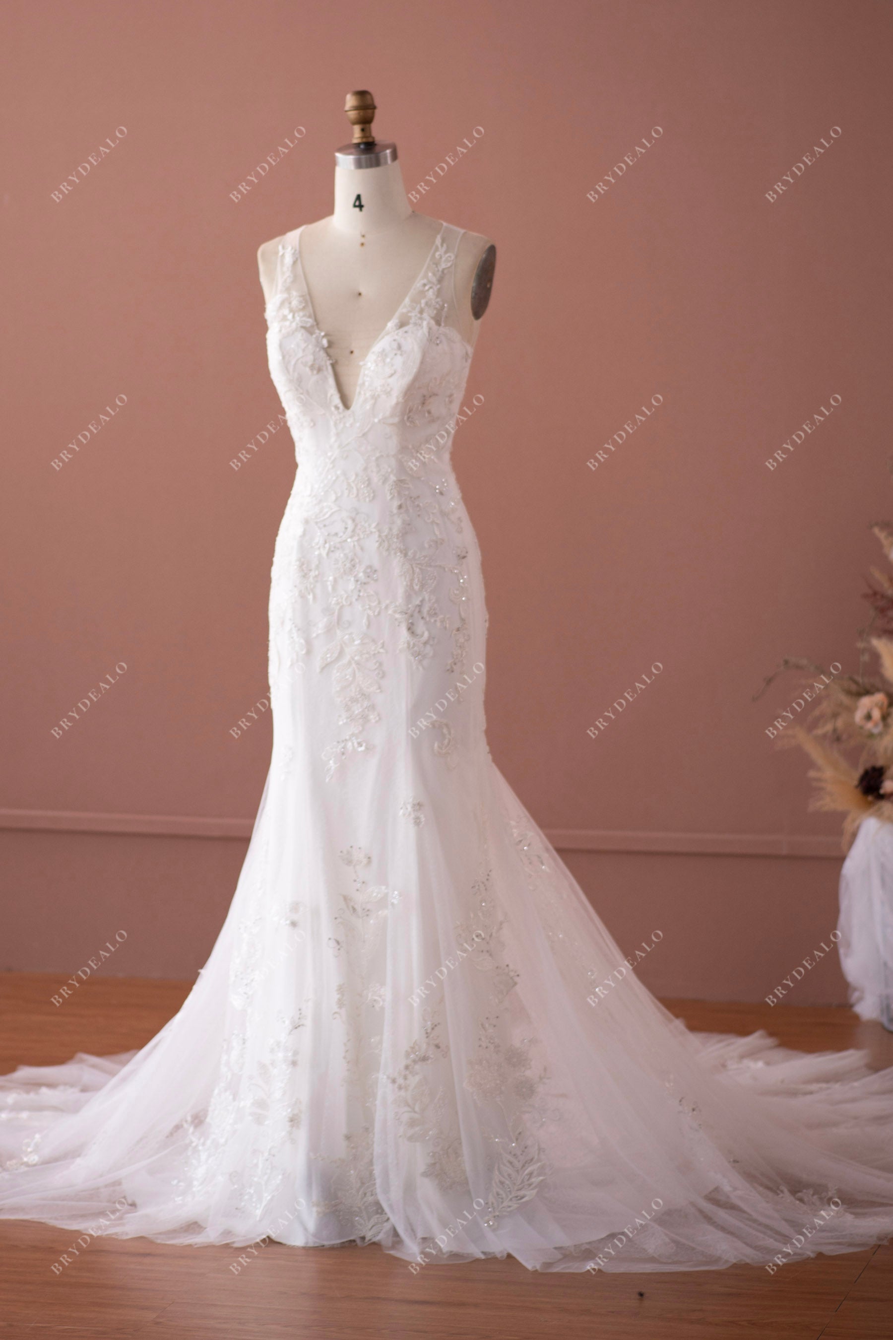 sleeveless beaded lace trumpet bridal dress