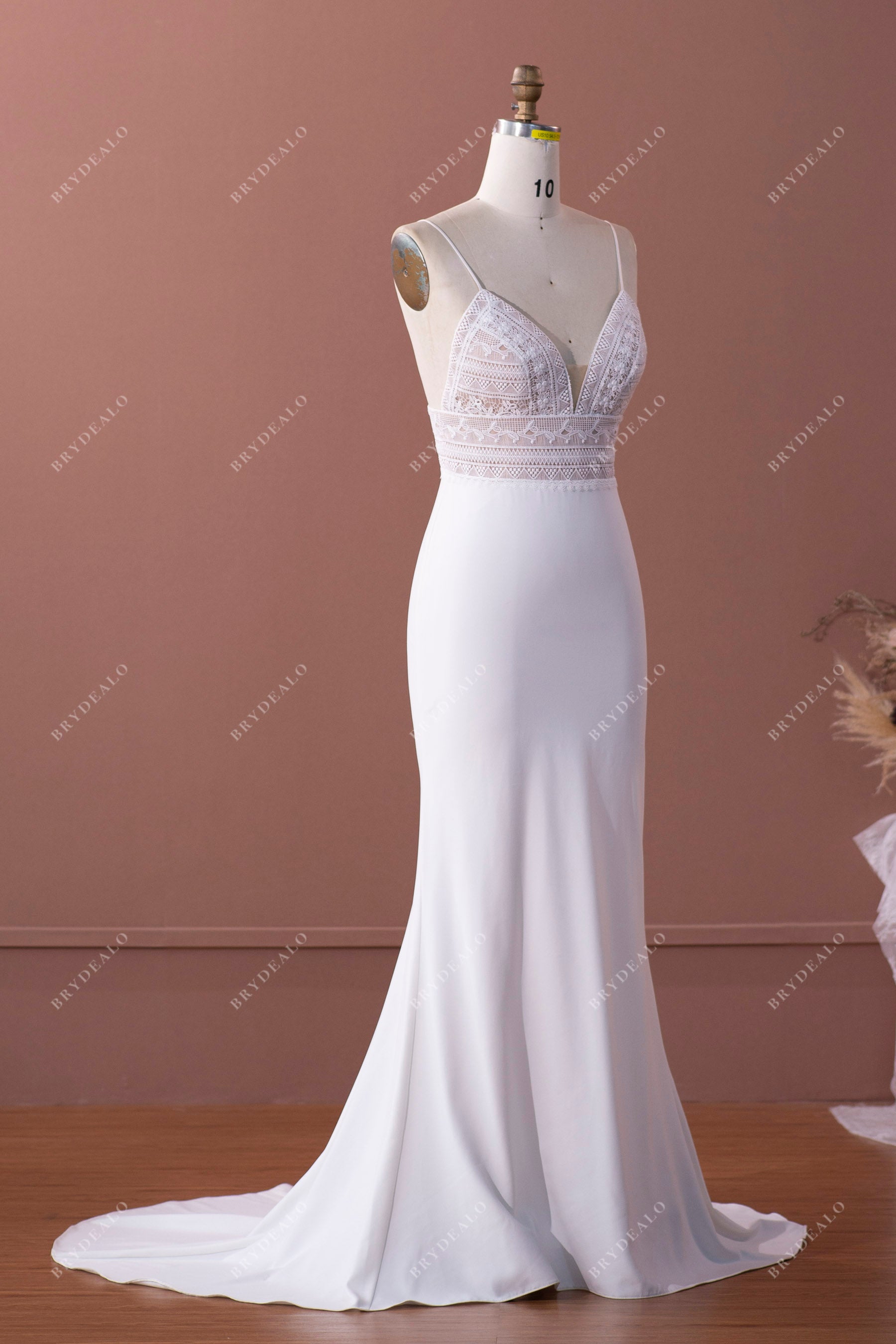sleeveless plunging neck trumpet bridal dress