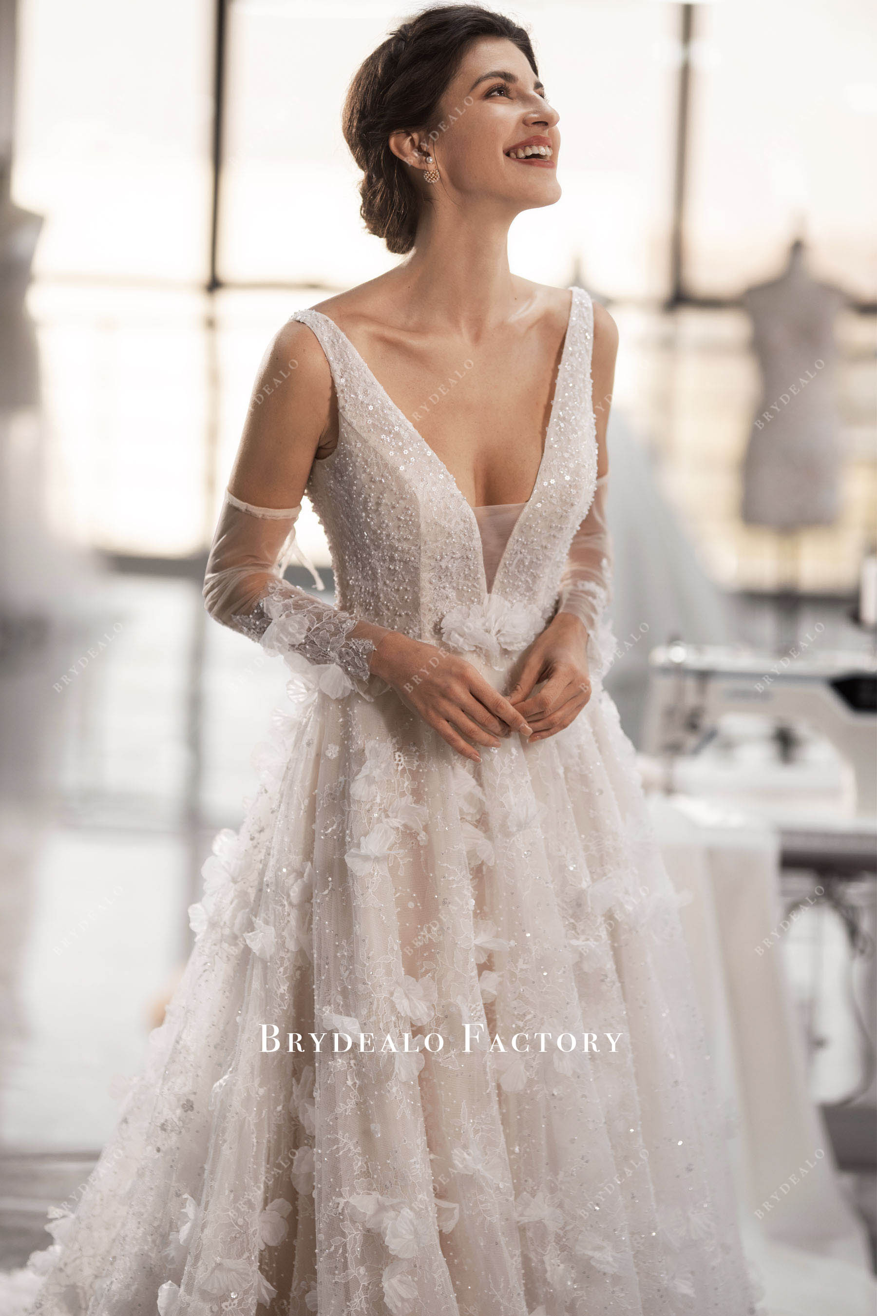 sleeveless plunging lace wedding dress
