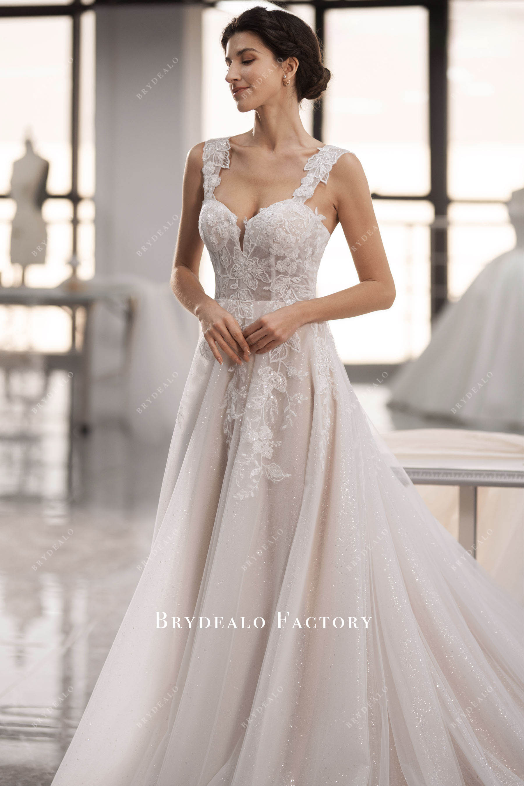 sweetheart beaded lace wedding gown