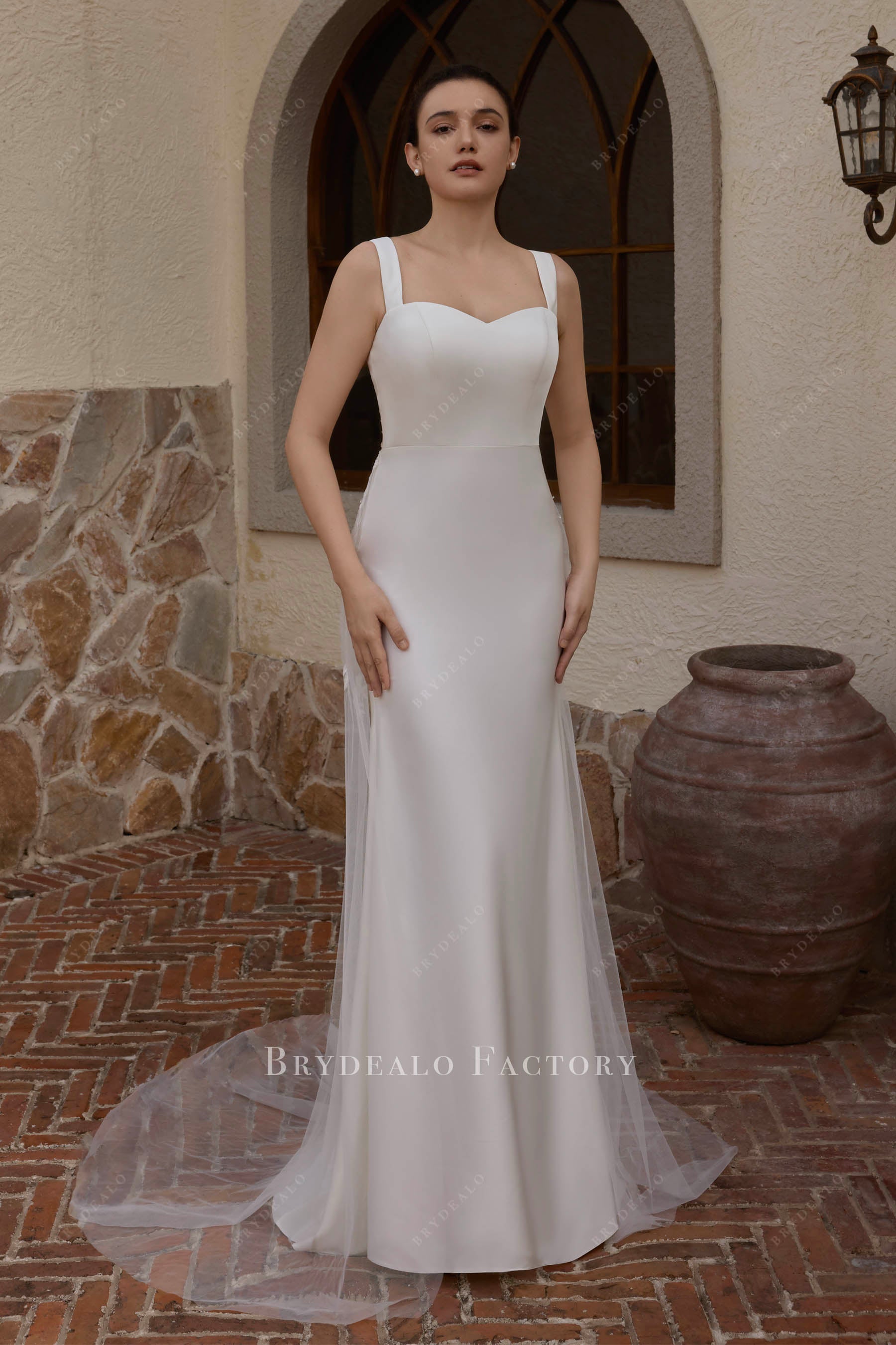white crepe sleeveless wedding dress