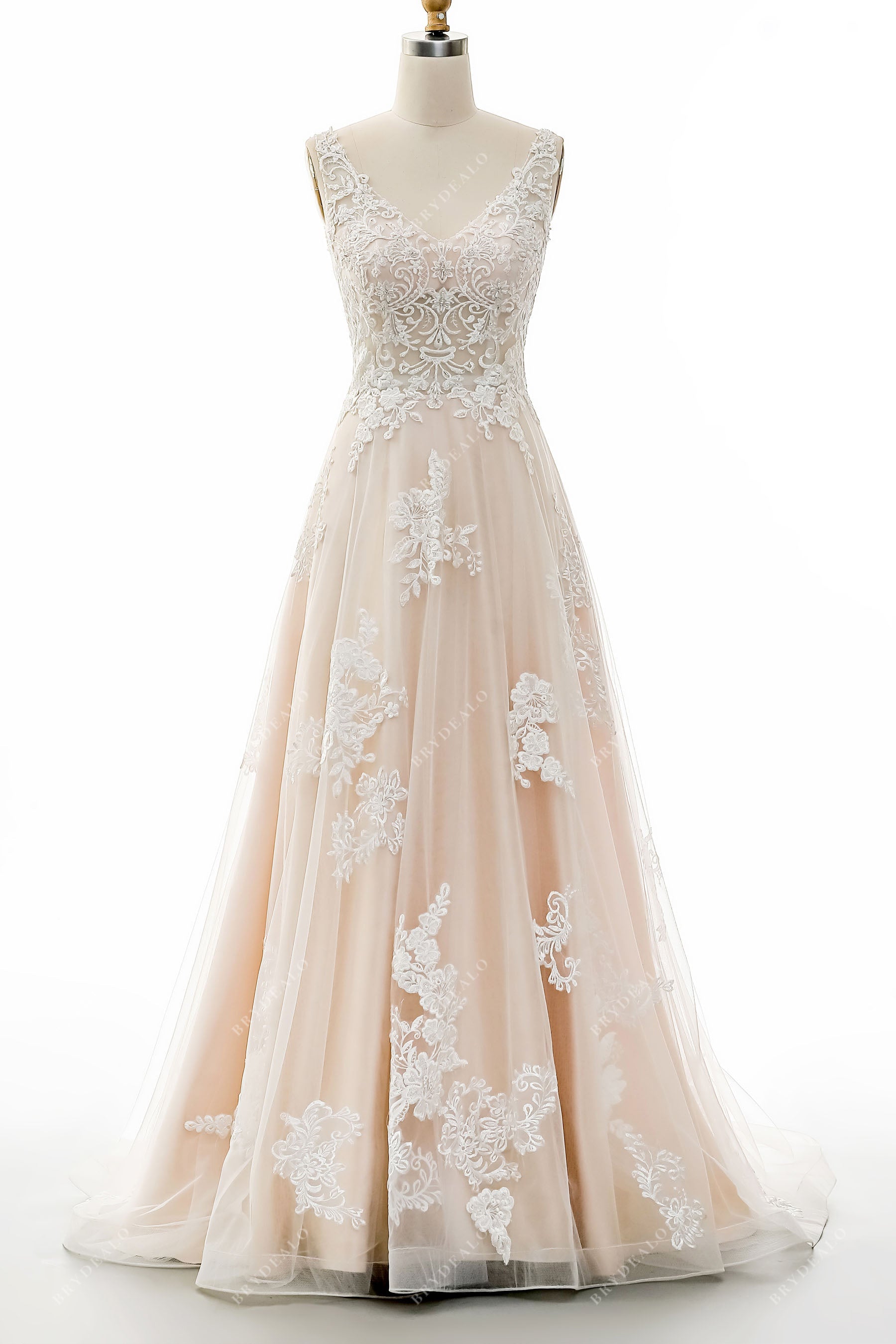 sleeveless lace appliqued tulle wedding gown