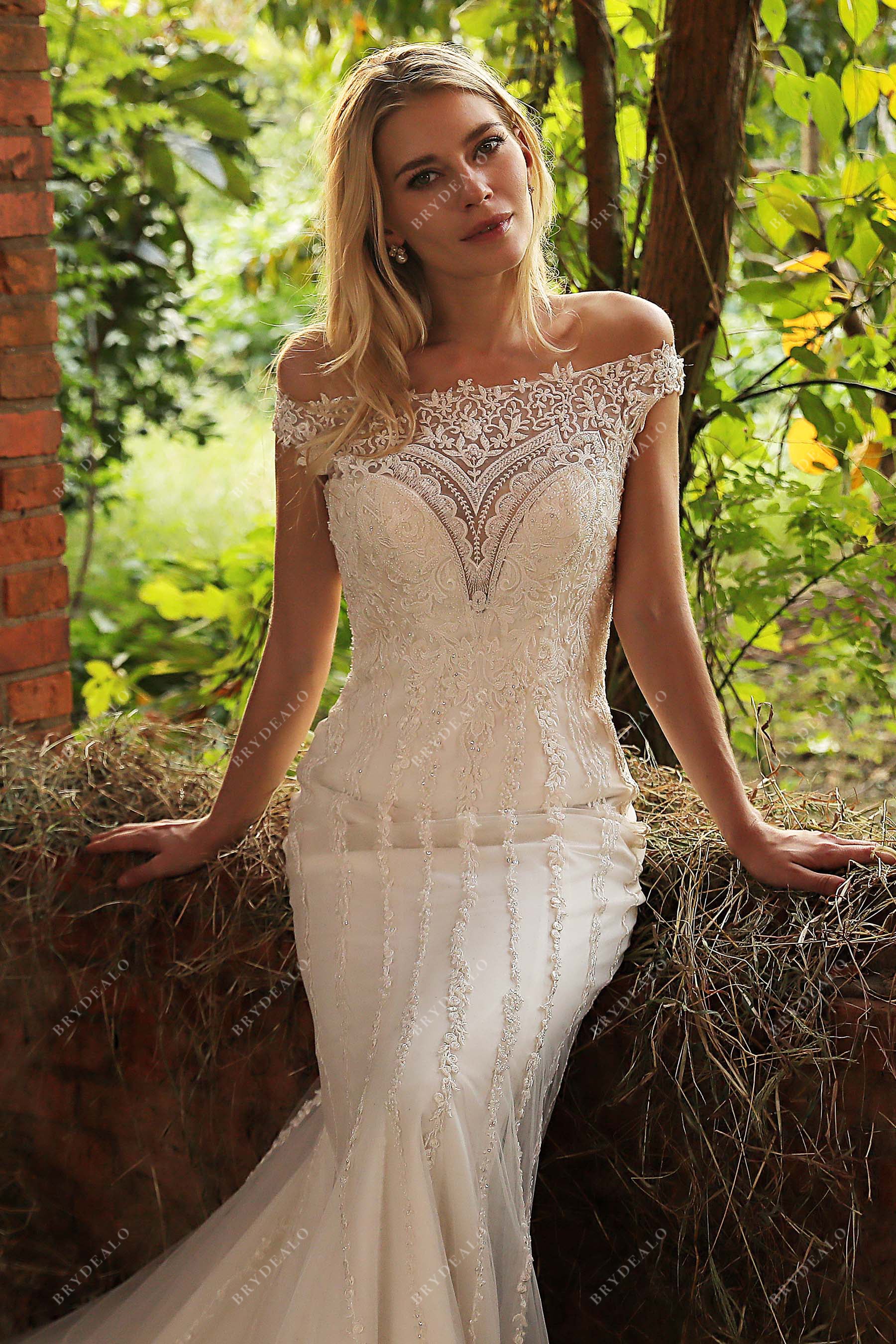 designer illusion sweetheart neck off-shoulder wedding gown