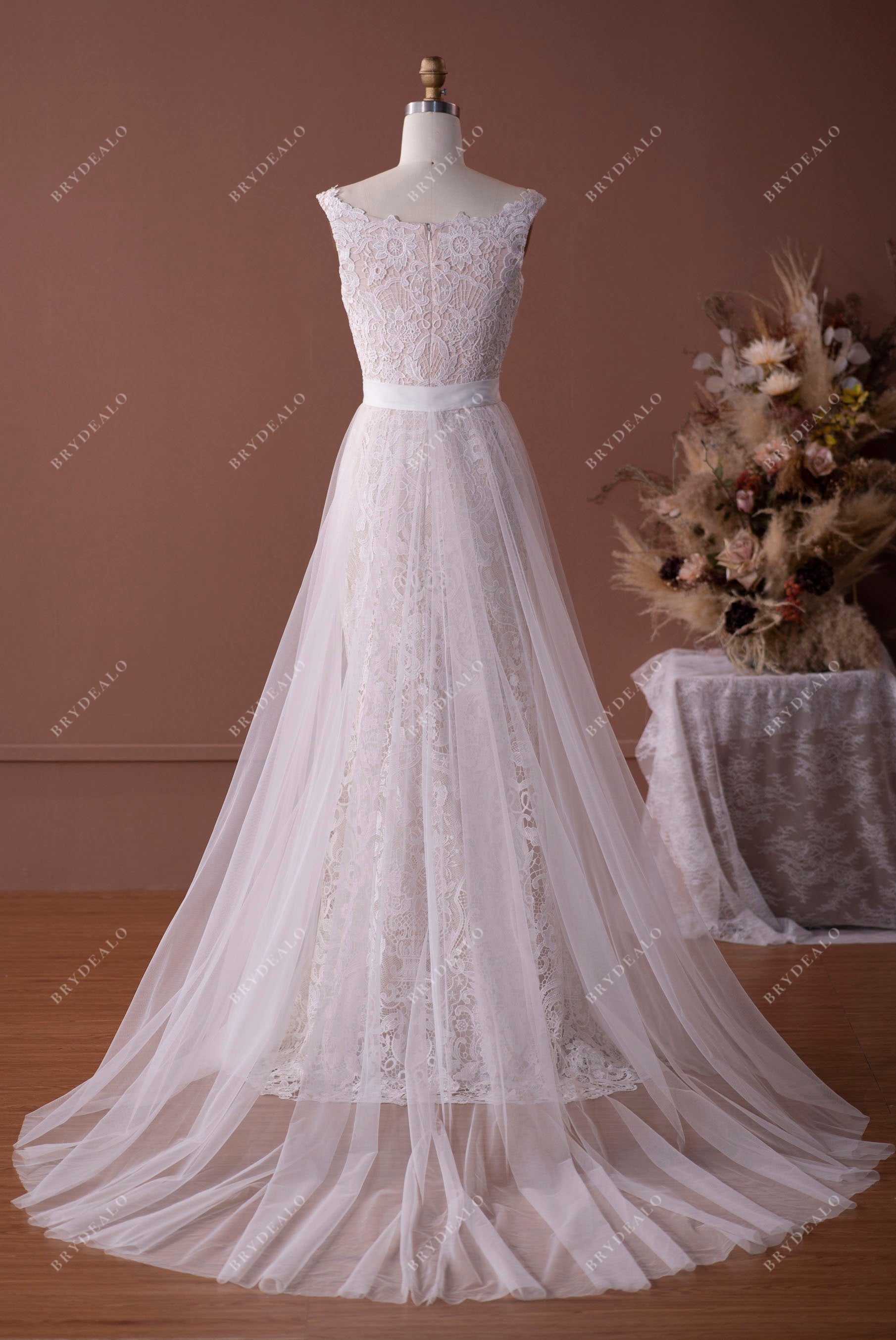 chapel train A-line tulle overskirt bridal gown