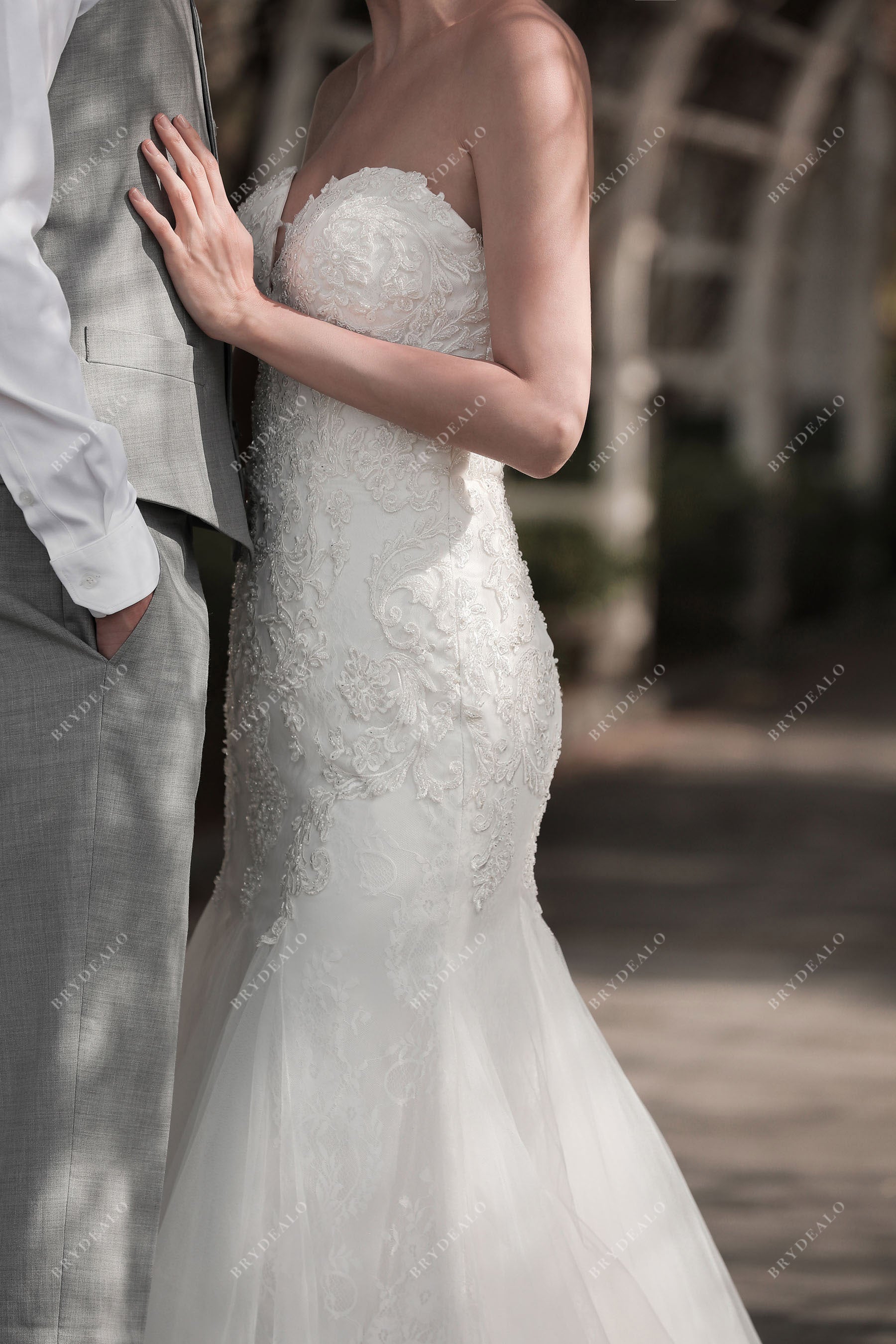 fit and flare designer lace bridal gown