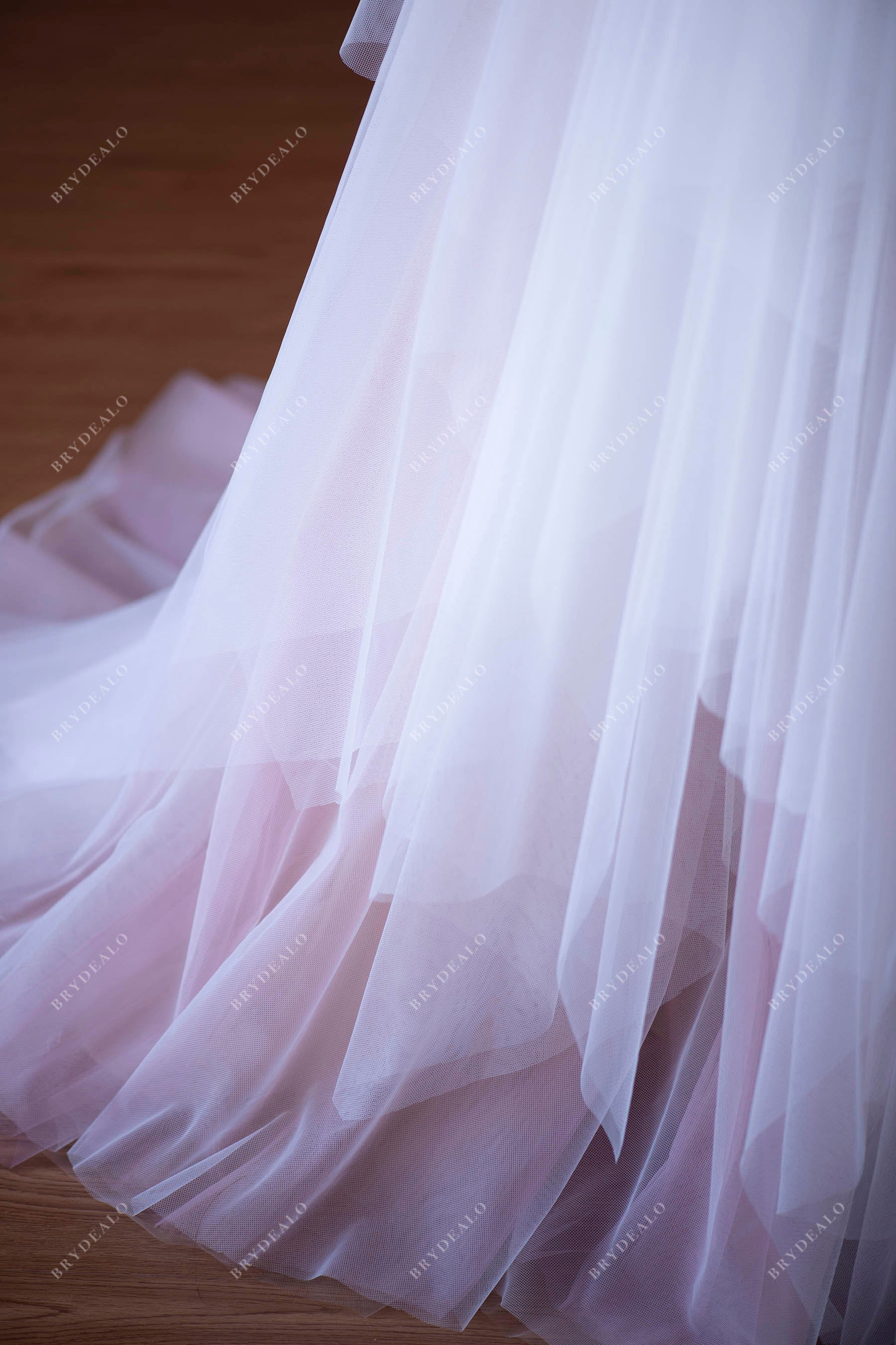 ethereal tulle city wedding ball gown