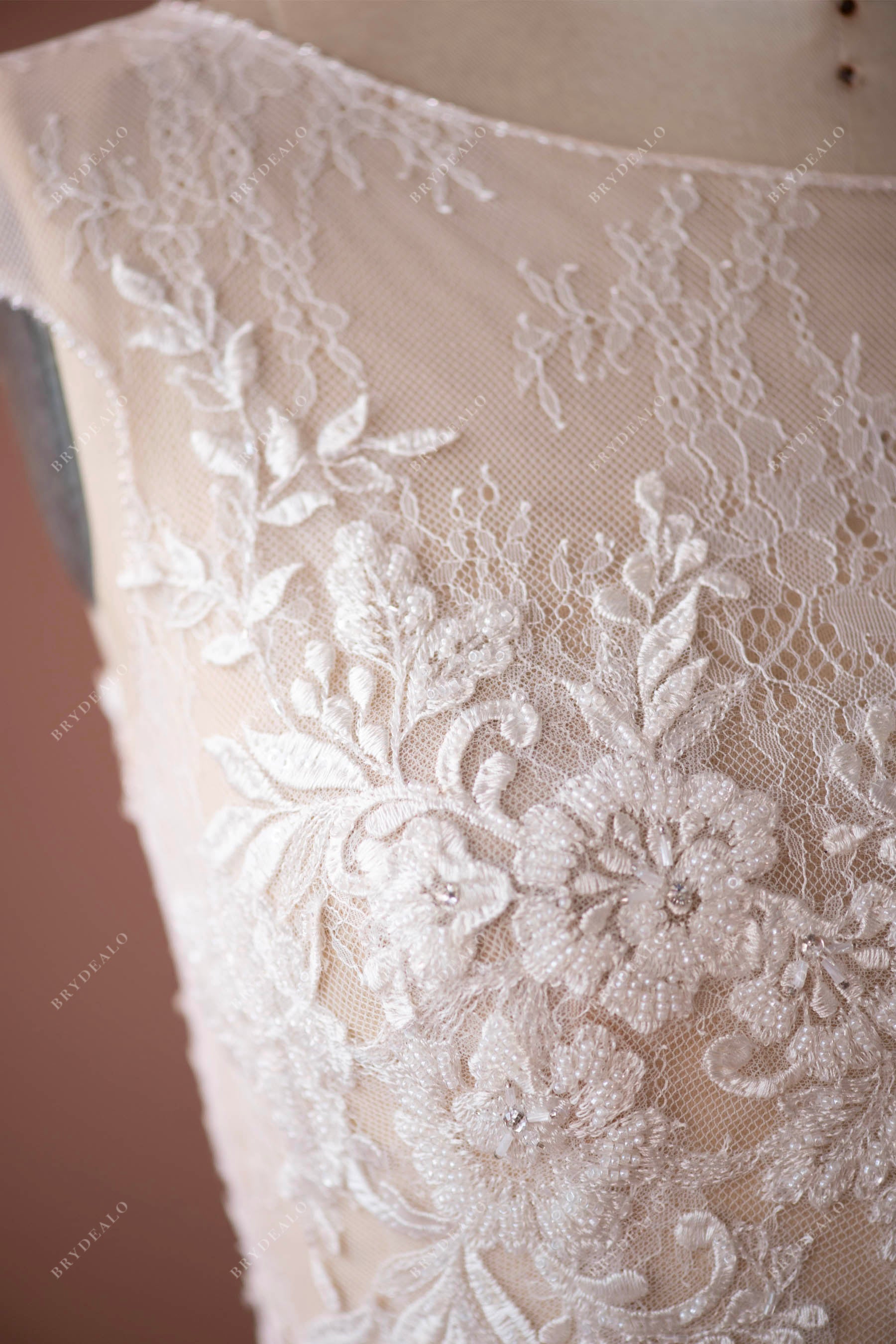 Beaded flower lace designer bridal gown