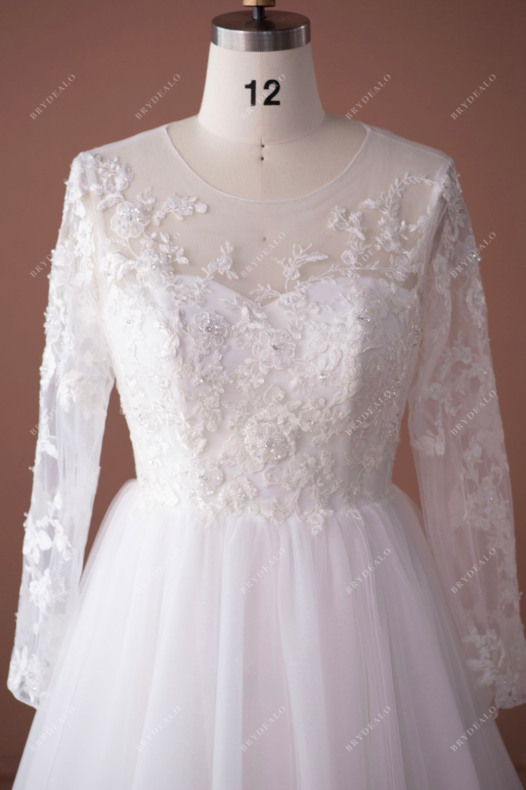 sheer neck beaded flower long sleeved wedding dress