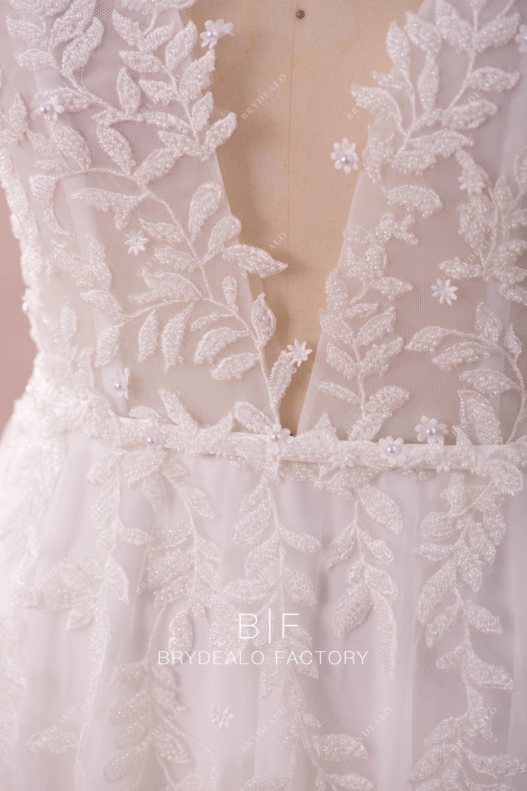 beaded lace deep neck bridal gown with belt
